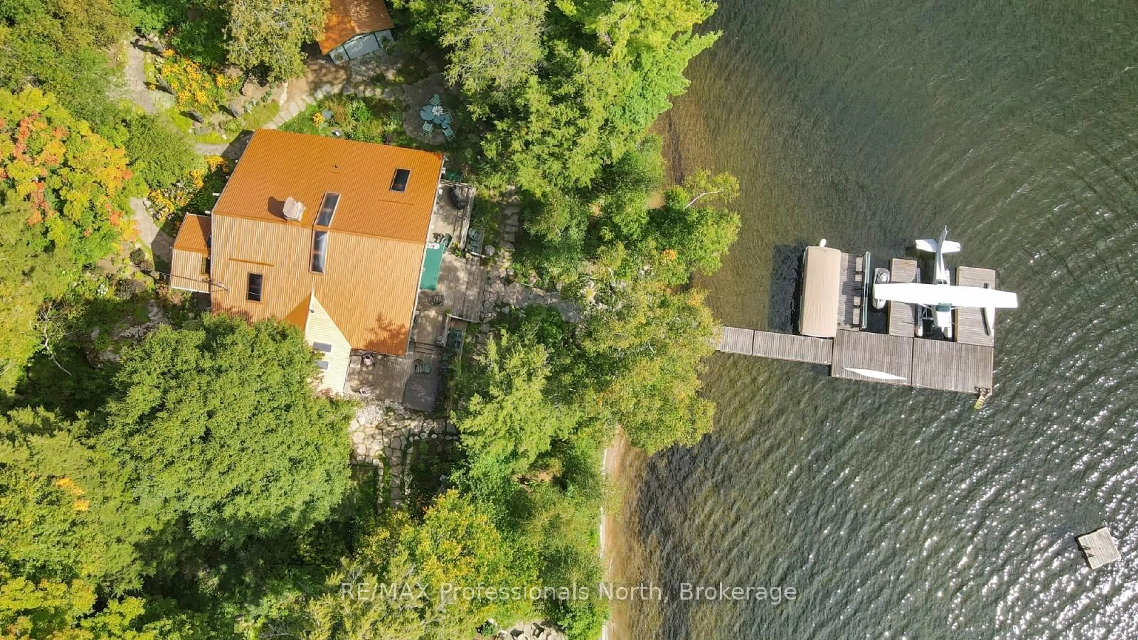 A pic from outside/outdoor area/front of a property/back of a property/a pic from drone, water/lake/river/ocean view for 2718 Wilkinson Rd, Dysart et al Ontario K0M 1S0