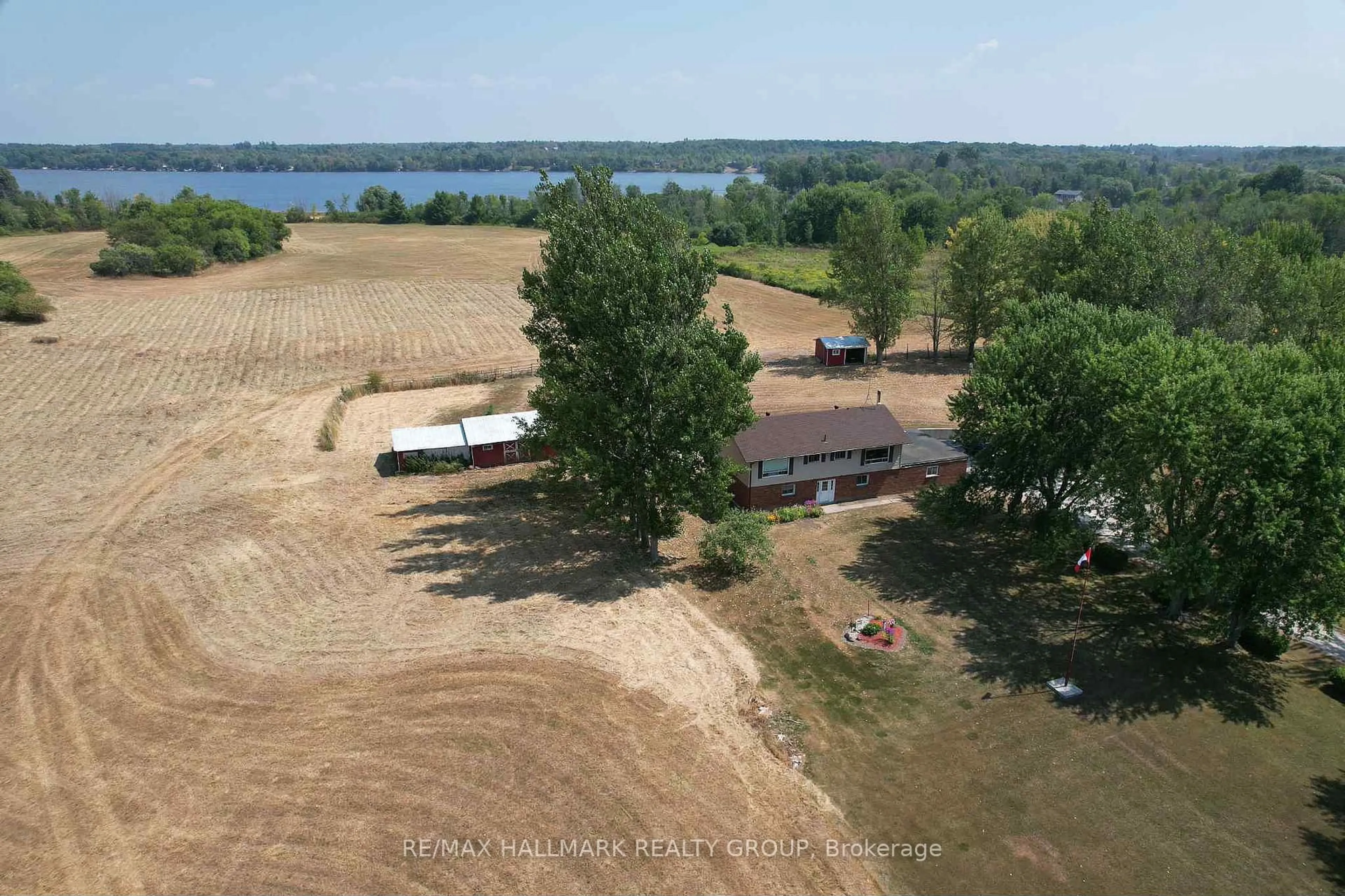 A pic from outside/outdoor area/front of a property/back of a property/a pic from drone, water/lake/river/ocean view for 307 County Rd 5 Rd, Front of Yonge Ontario K0E 1R0