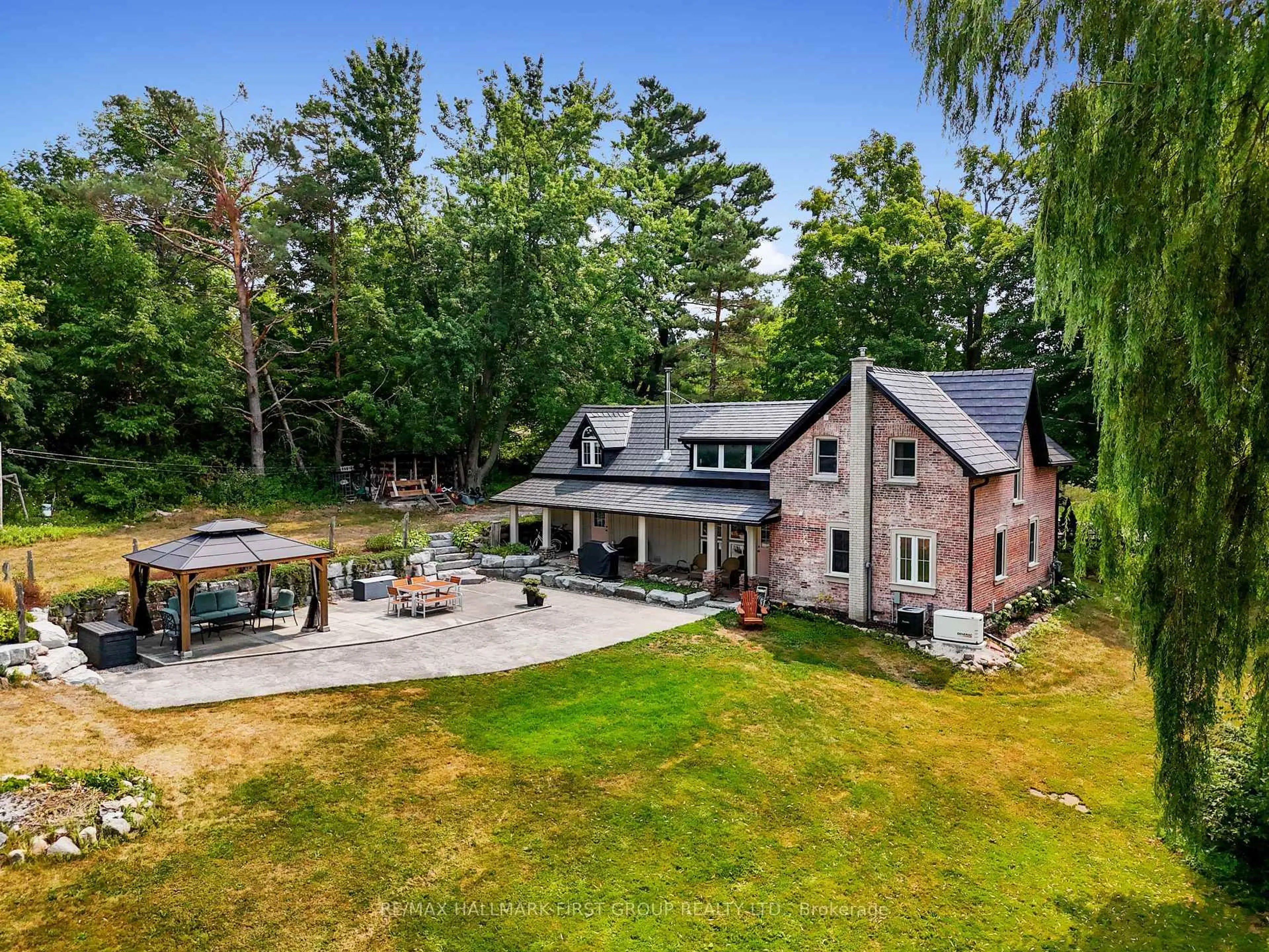 A pic from outside/outdoor area/front of a property/back of a property/a pic from drone, water/lake/river/ocean view for 13014 County 21 Rd, Cramahe Ontario K0K 1S0