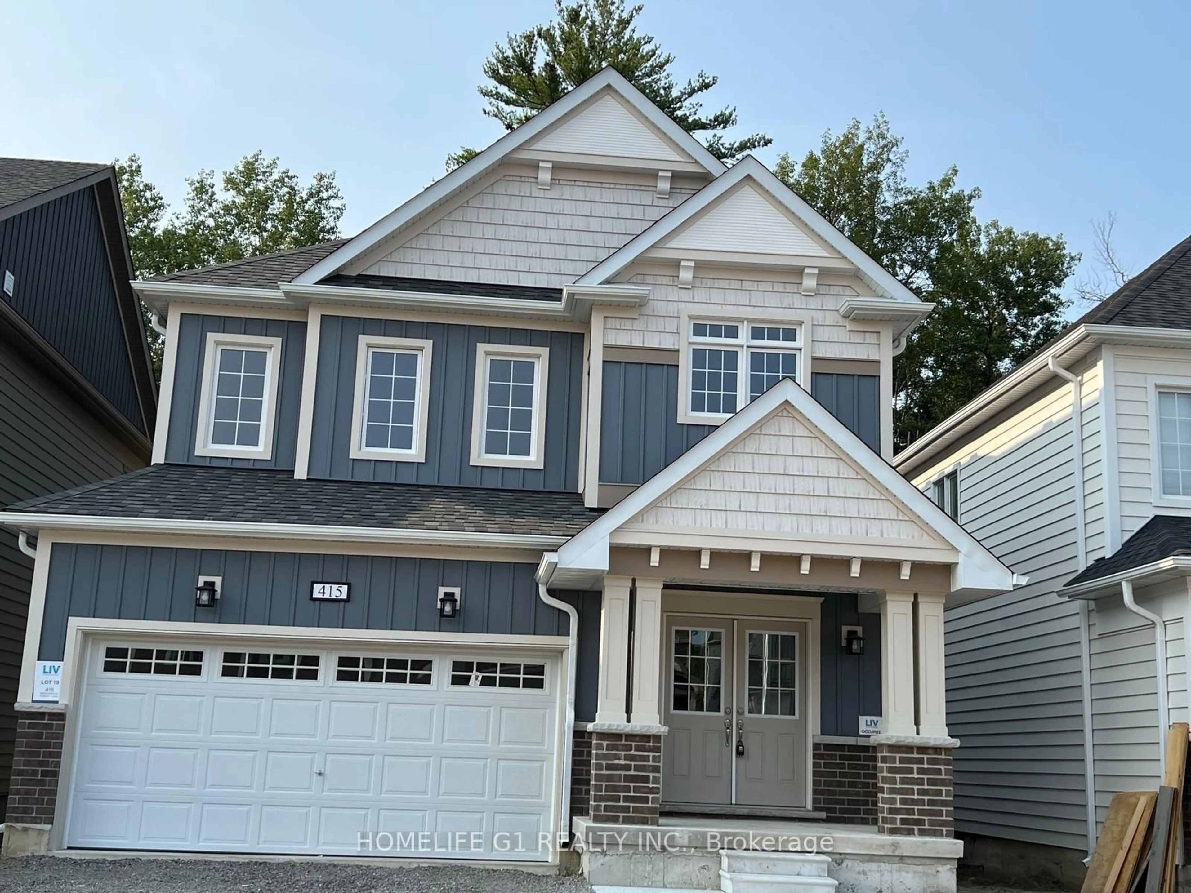 Home with vinyl exterior material, street for 415 Beechwood Forest Lane, Gravenhurst Ontario P1P 0H8