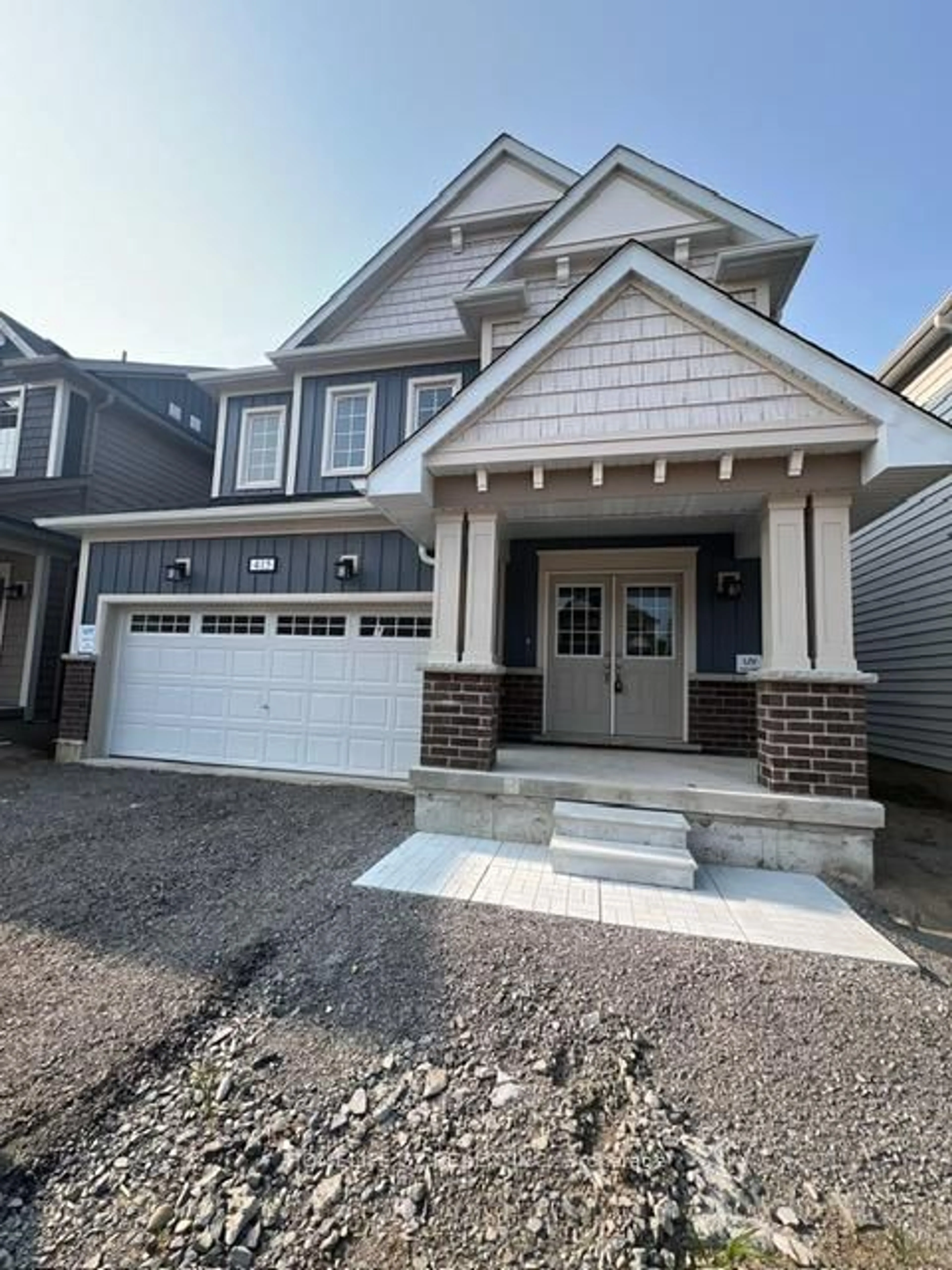 Home with brick exterior material, street for 415 Beechwood Forest Lane, Gravenhurst Ontario P1P 0H8