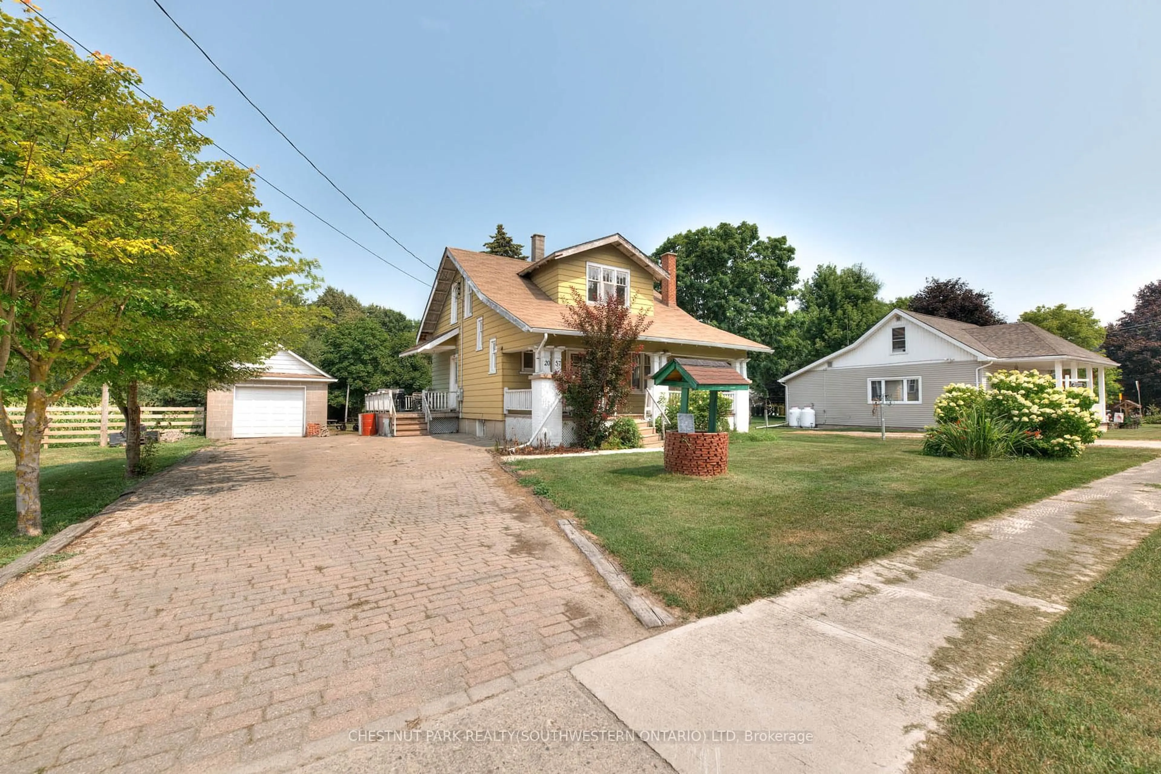 A pic from outside/outdoor area/front of a property/back of a property/a pic from drone, street for 2057 Martin St, Howick Ontario N0G 1X0