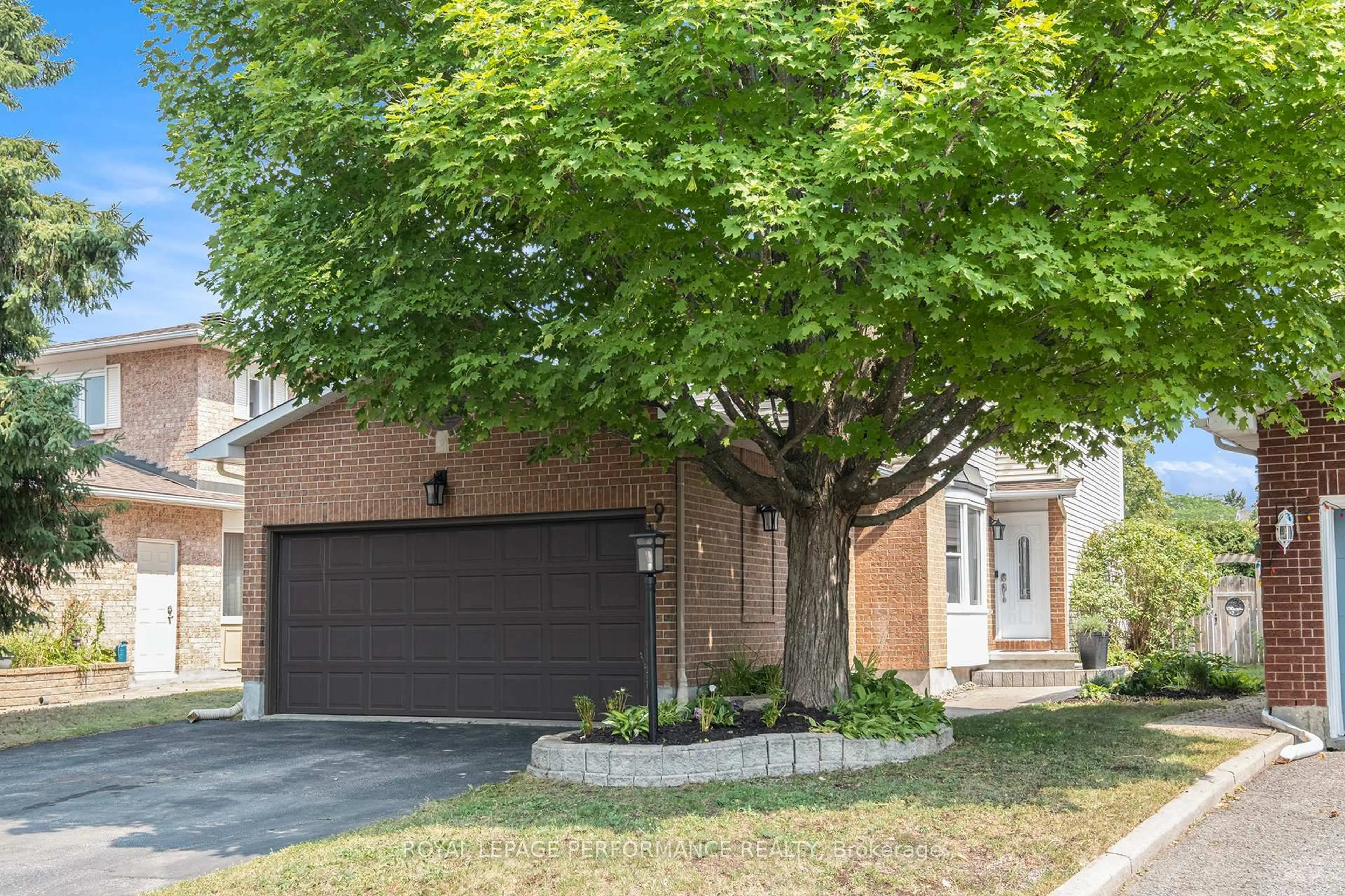Home with brick exterior material, street for 9 Longden Pl, Kanata Ontario K2M 1V1