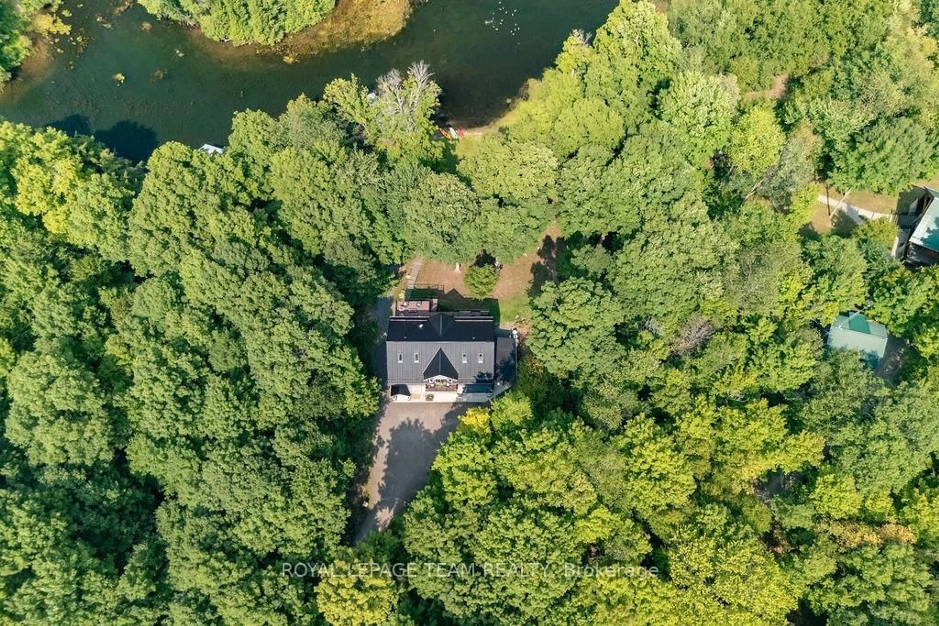 A pic from outside/outdoor area/front of a property/back of a property/a pic from drone, water/lake/river/ocean view for 104 Penny Lane, Rideau Lakes Ontario K0G 1V0