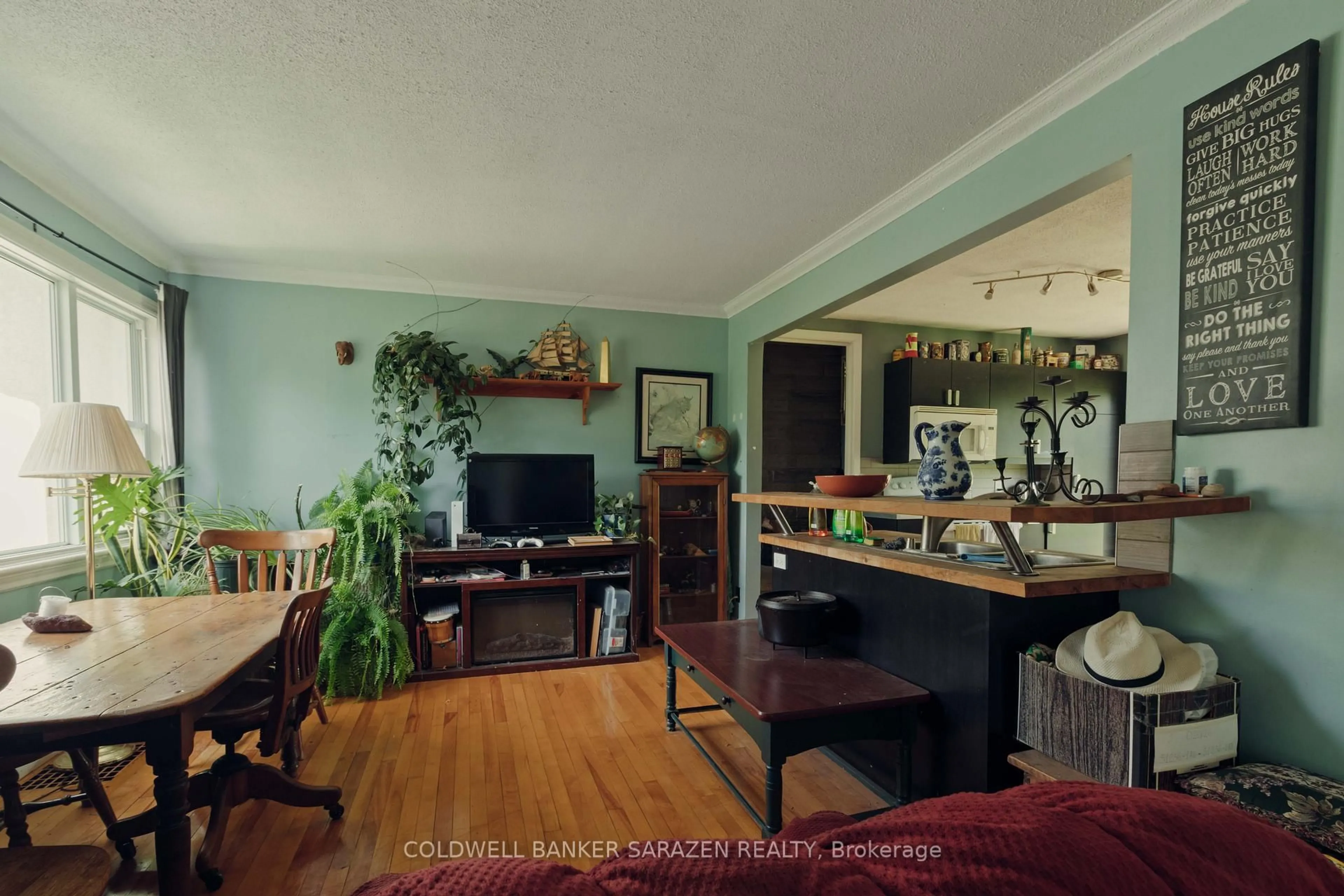 Living room with furniture, wood/laminate floor for 2013 Prince Of Wales Dr, Ottawa Ontario K2C 3J7