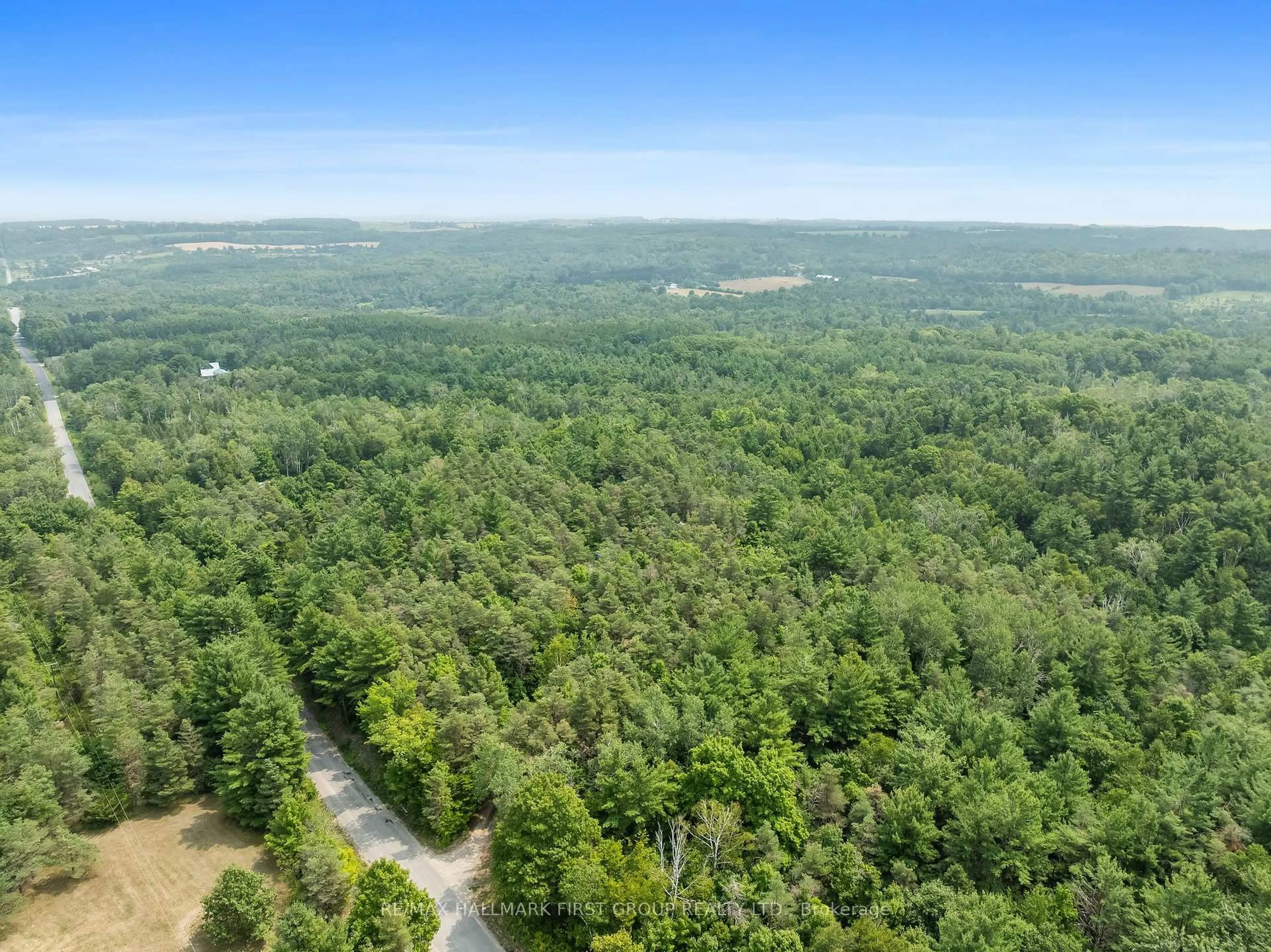 A pic from outside/outdoor area/front of a property/back of a property/a pic from drone, forest/trees view for 501 Zion Line, Cavan Monaghan Ontario L0A 1G0