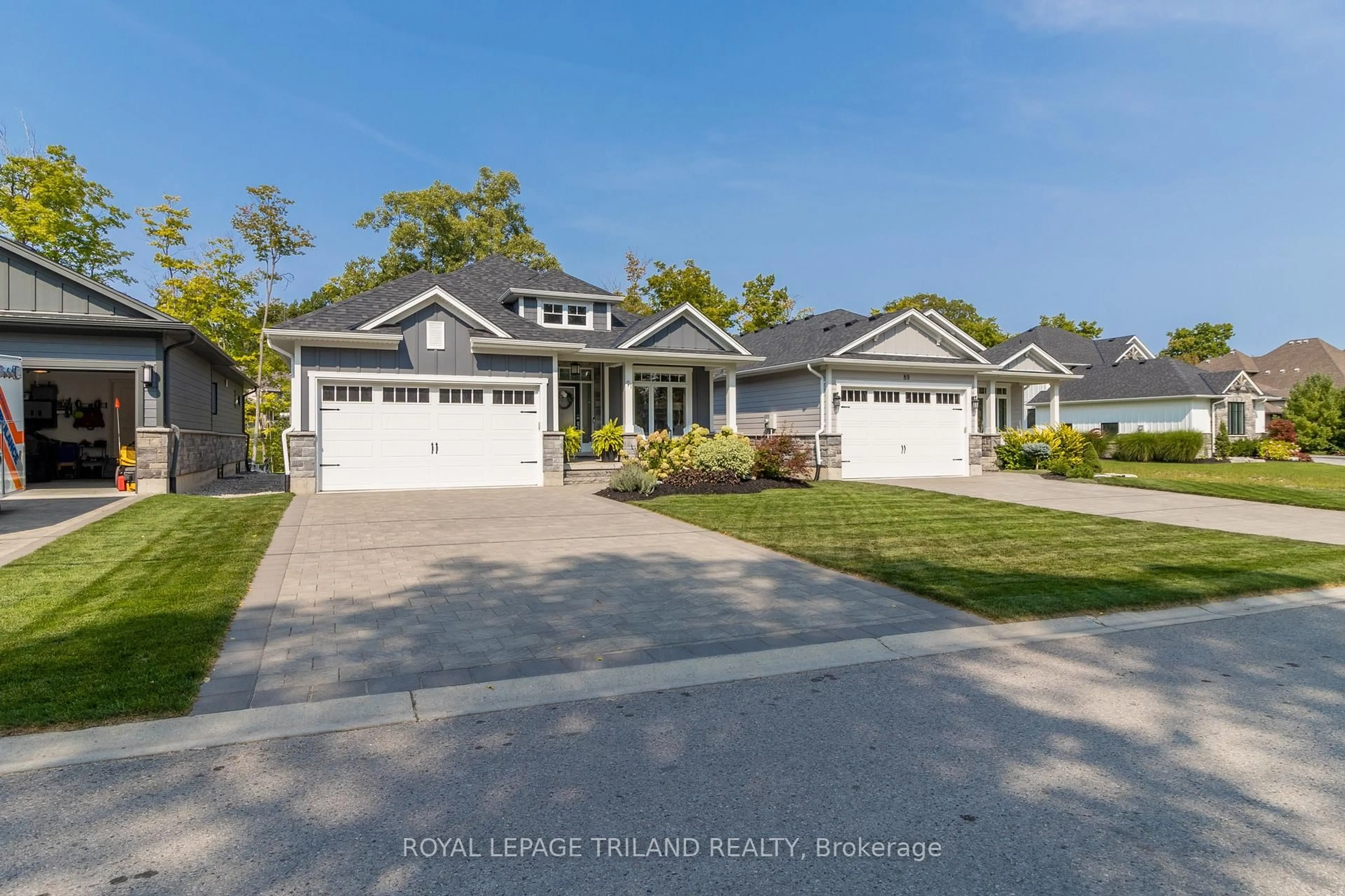 Home with vinyl exterior material, street for 91 Gill Rd, Lambton Shores Ontario N0M 1T0