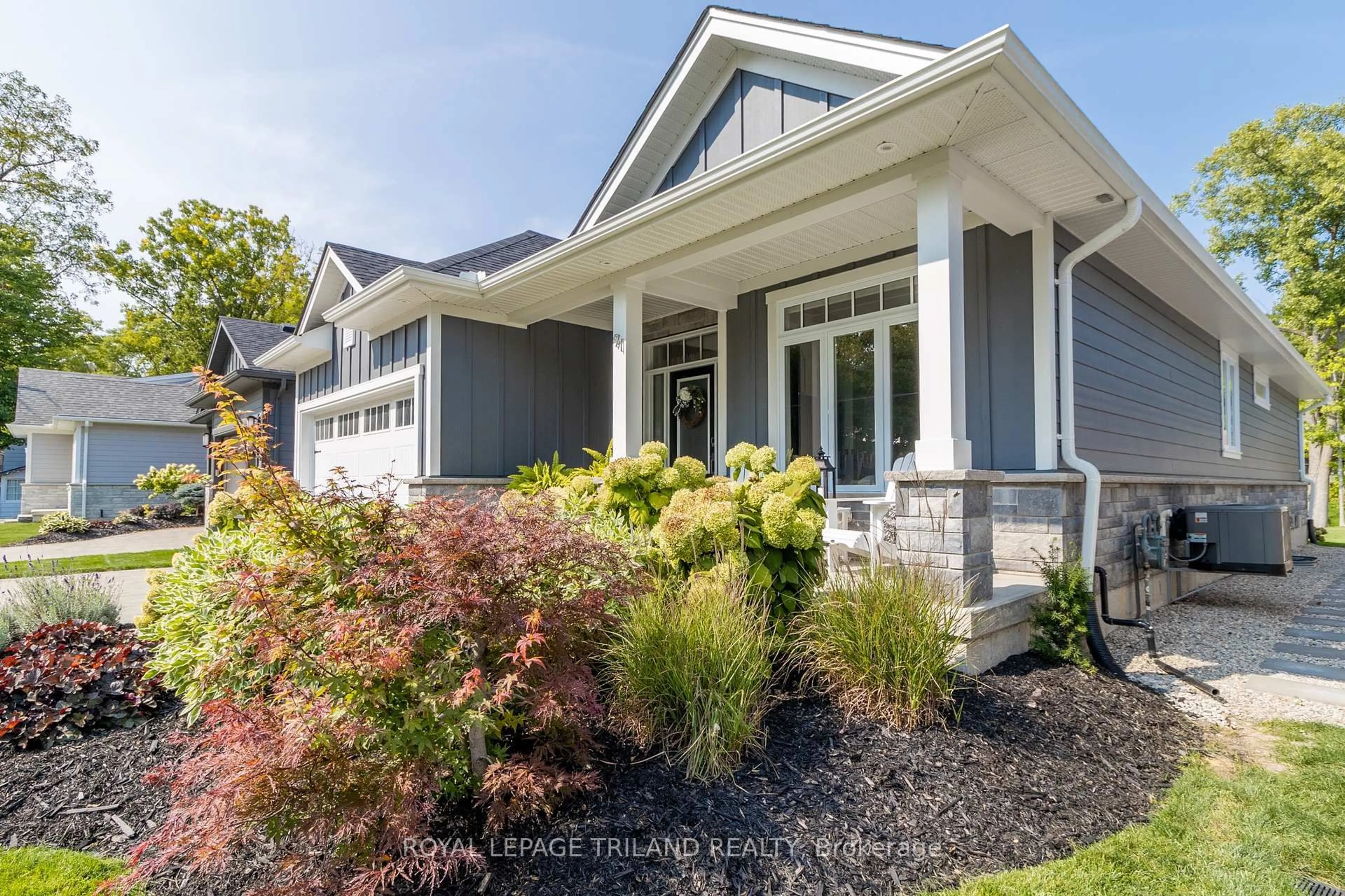 Home with vinyl exterior material, street for 91 Gill Rd, Lambton Shores Ontario N0M 1T0