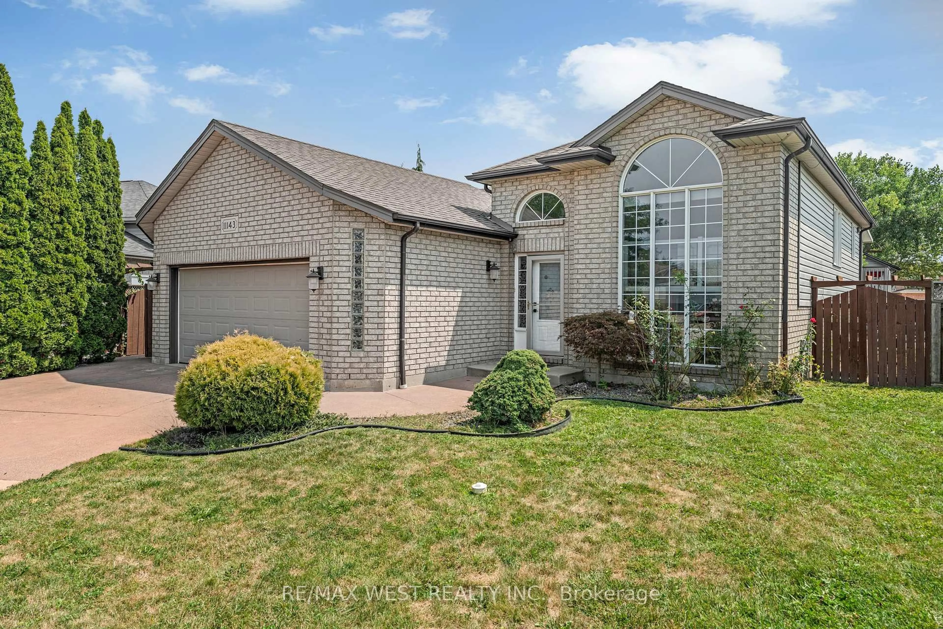 Home with brick exterior material, street for 11143 Ancona Cres, Windsor Ontario N8R 2K2