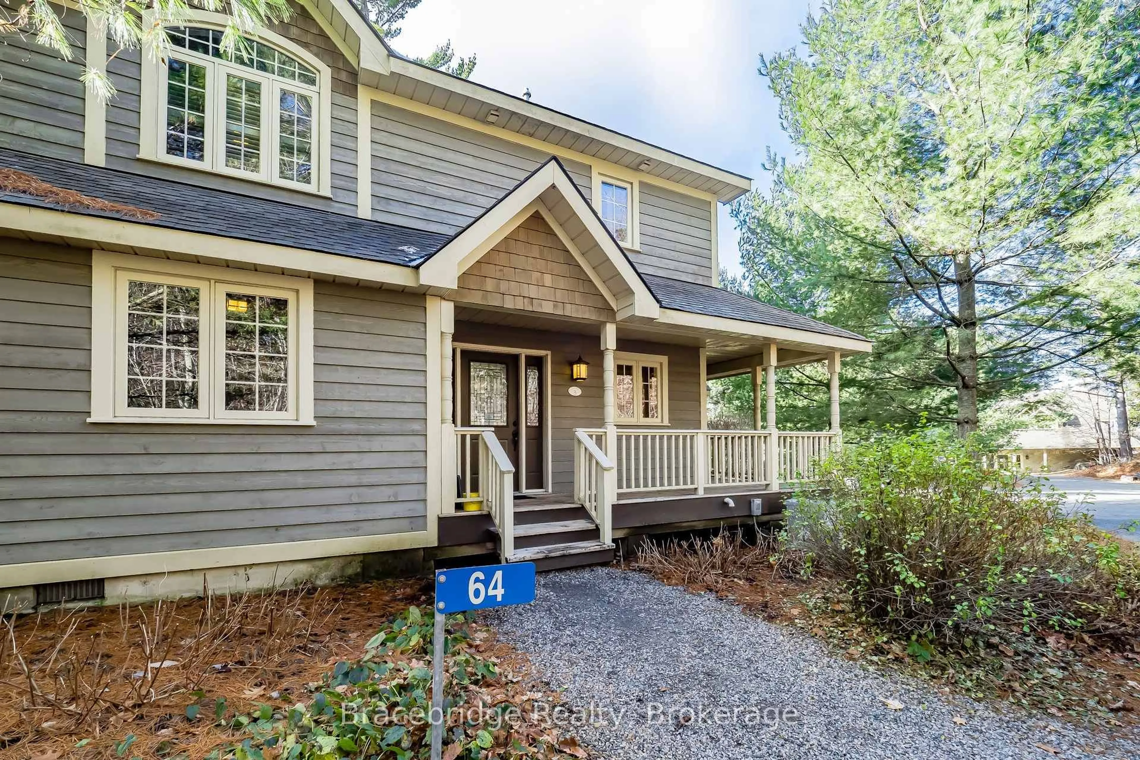 Home with vinyl exterior material, street for 3876 Muskoka Road 118 Rd #Carling 2 W5, Muskoka Lakes Ontario P0B 1J0
