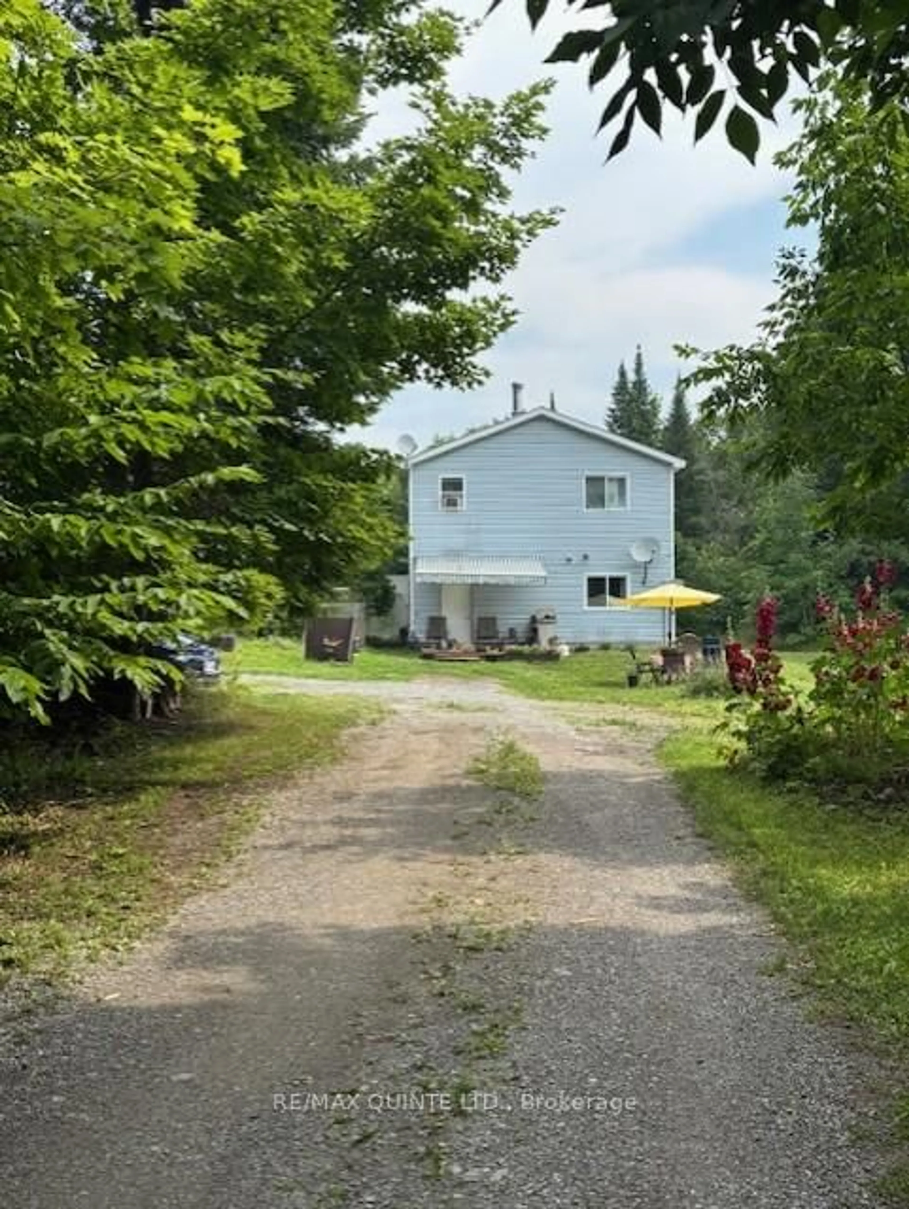 A pic from outside/outdoor area/front of a property/back of a property/a pic from drone, street for 18610 Hwy 62 Highway, Madoc Ontario K0K 2K0