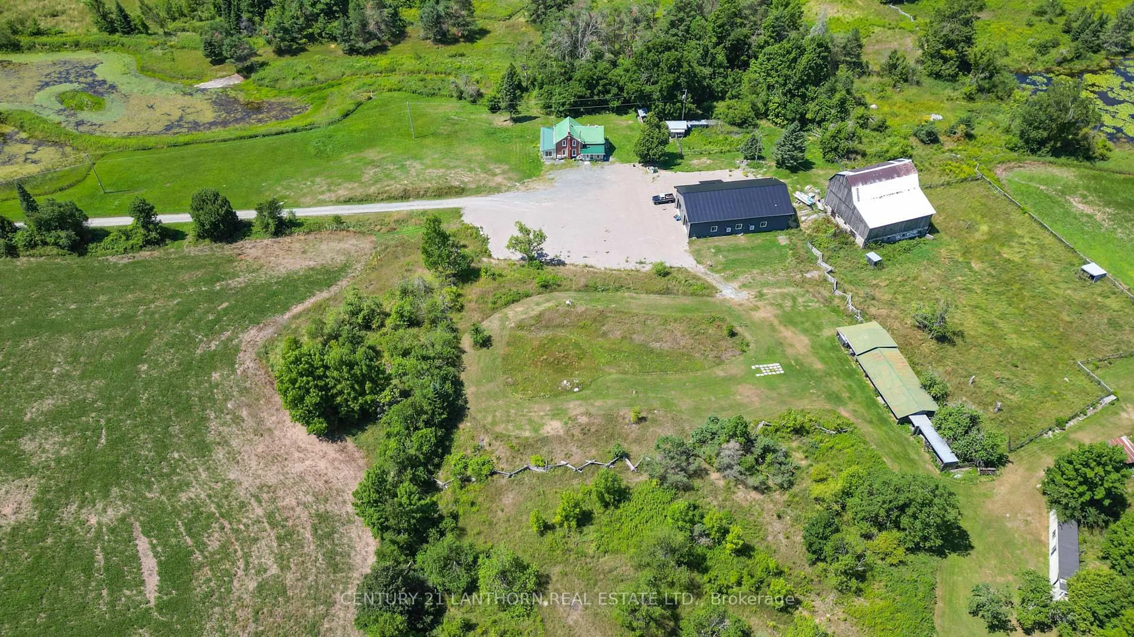 A pic from outside/outdoor area/front of a property/back of a property/a pic from drone, unknown for 495 Barker Rd, Madoc Ontario K0K 2K0