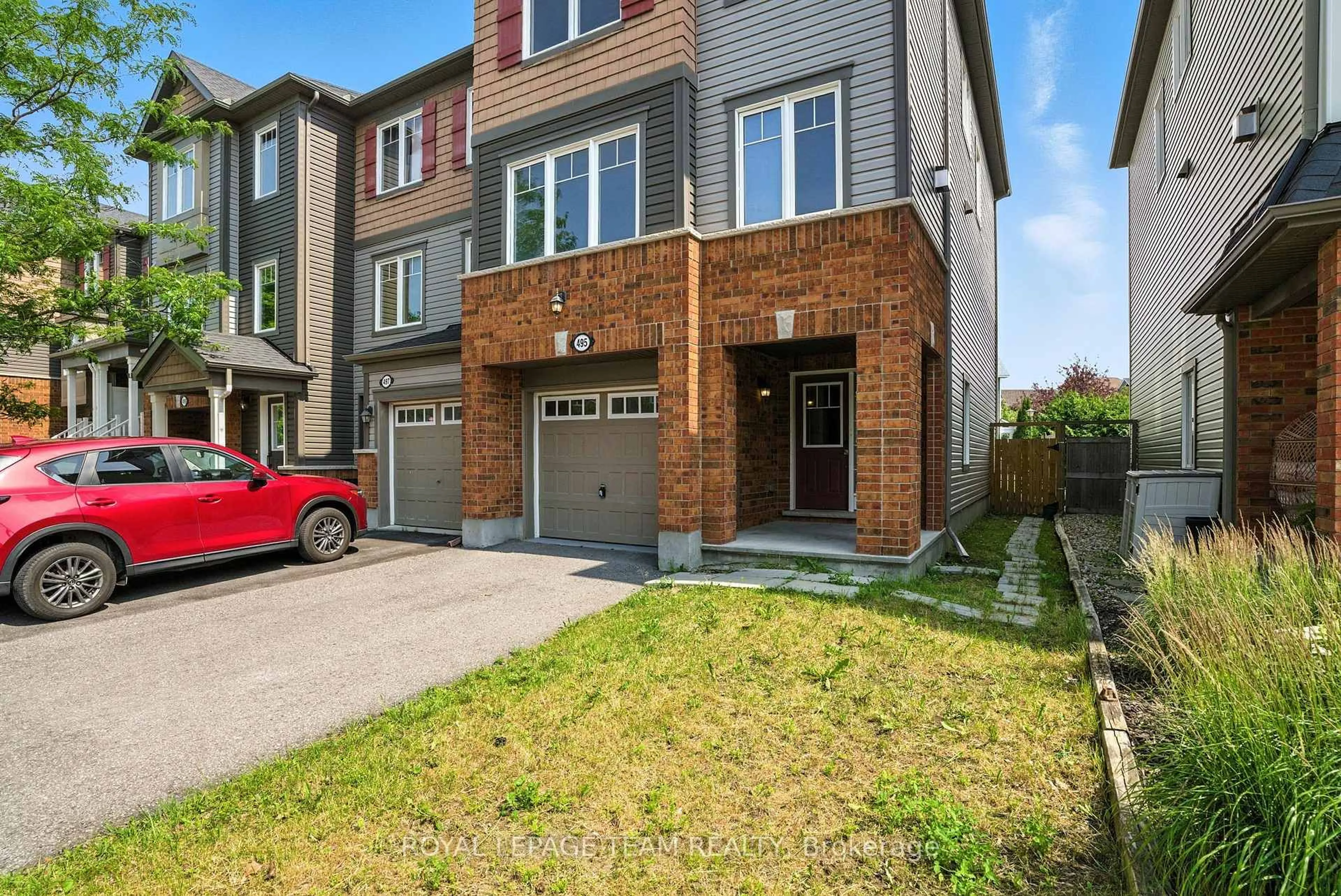 Home with brick exterior material, street for 495 Coldwater Cres, Ottawa Ontario K2M 0J4