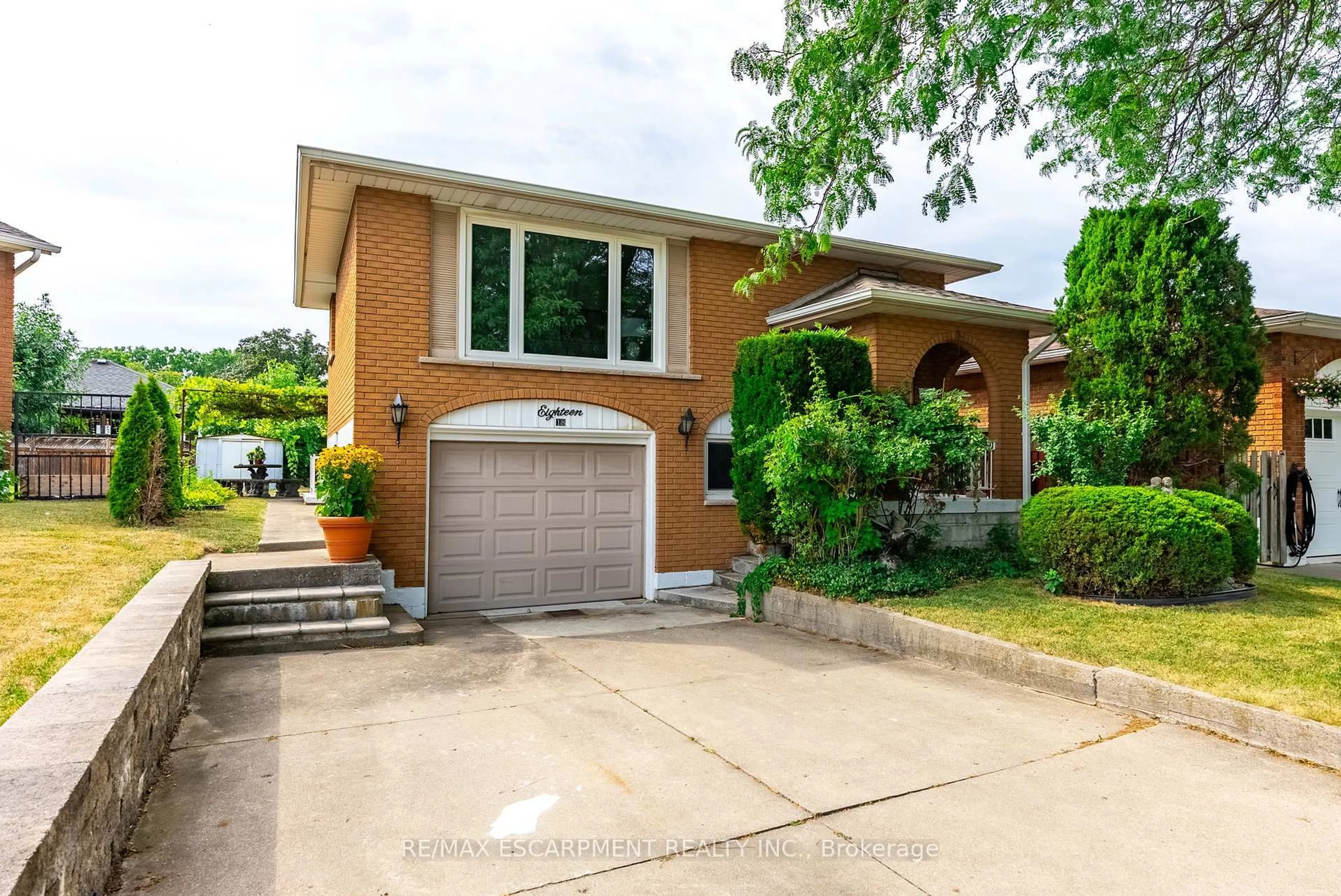 Home with brick exterior material, street for 18 Renner Crt, Hamilton Ontario L8K 6J4
