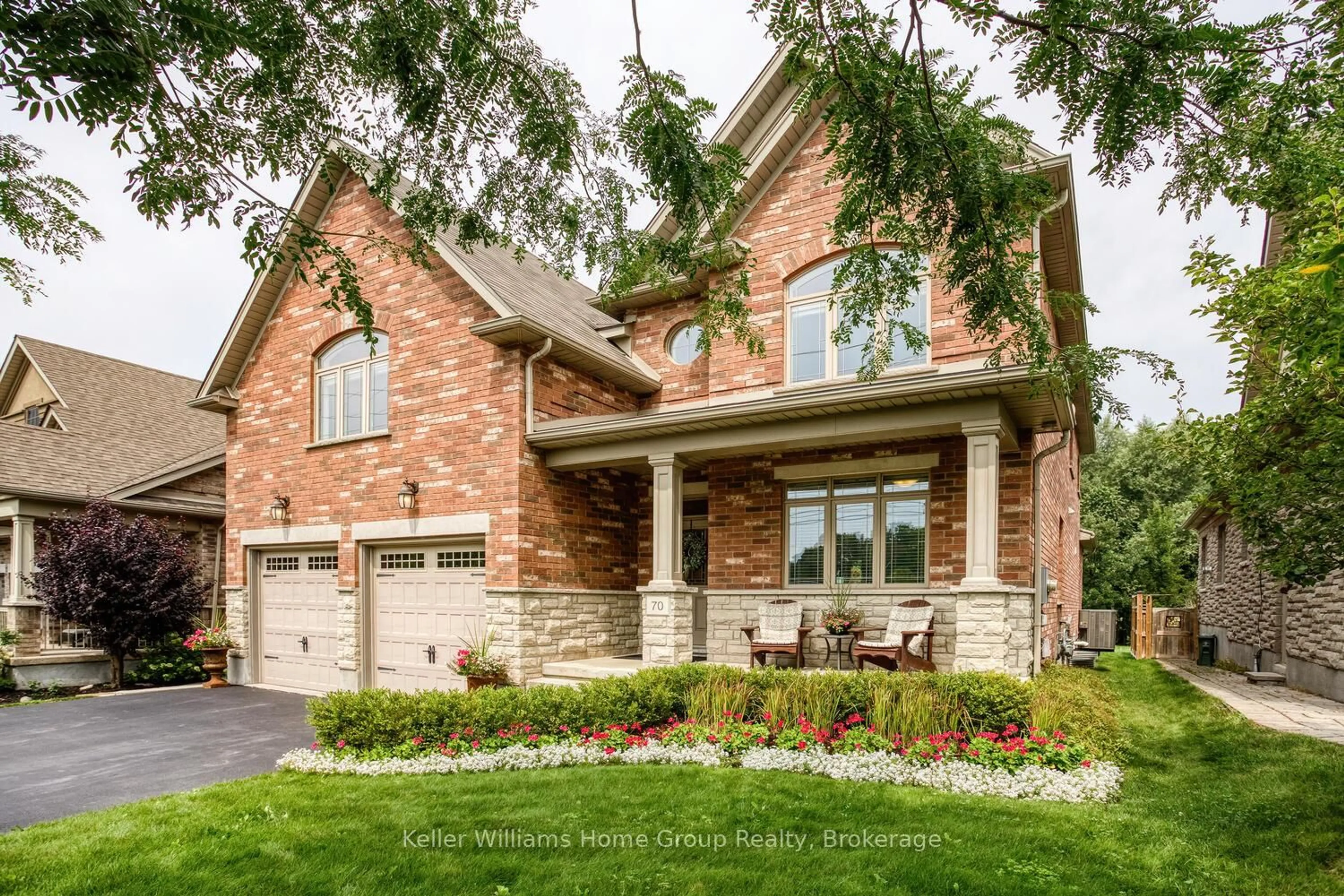 Home with brick exterior material, street for 70 Waverley Dr, Guelph Ontario N1E 6C8