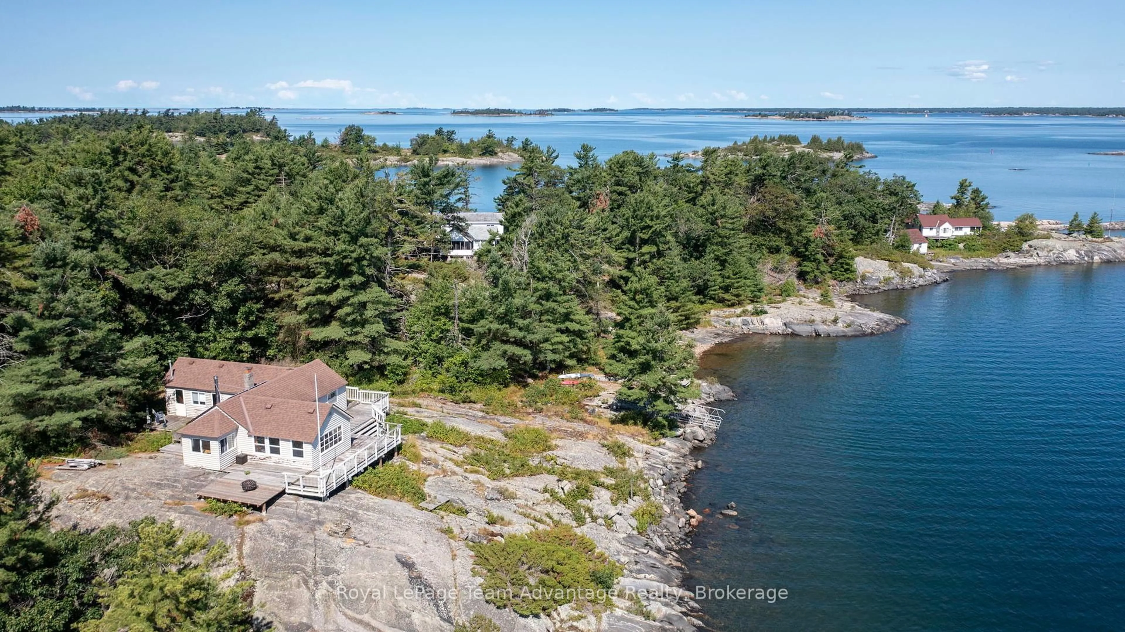 A pic from outside/outdoor area/front of a property/back of a property/a pic from drone, water/lake/river/ocean view for 3 Island 57C, Carling Ontario P0G 1G0