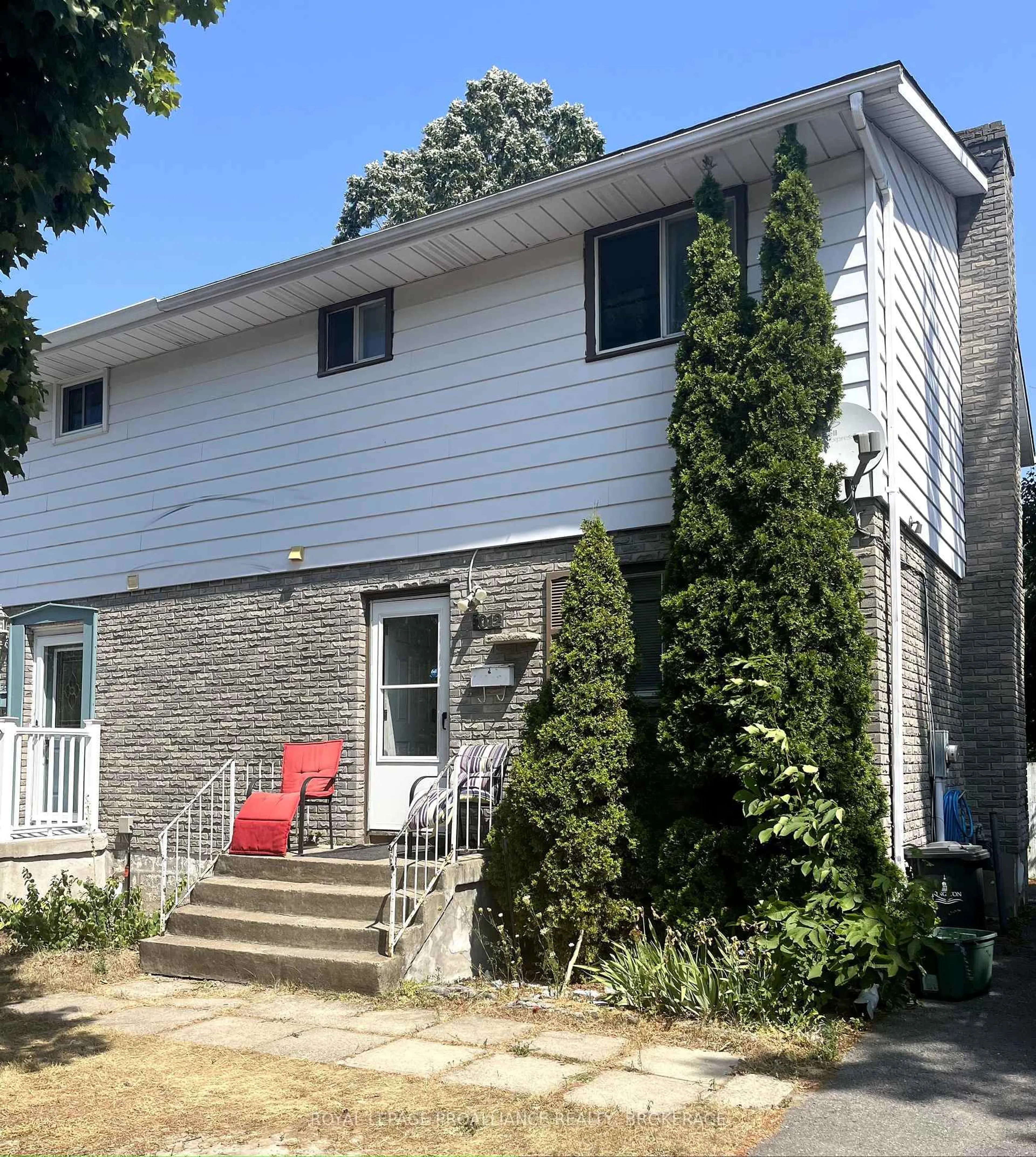 Home with vinyl exterior material, street for 1012 Old Colony Rd, Kingston Ontario K7P 1K3