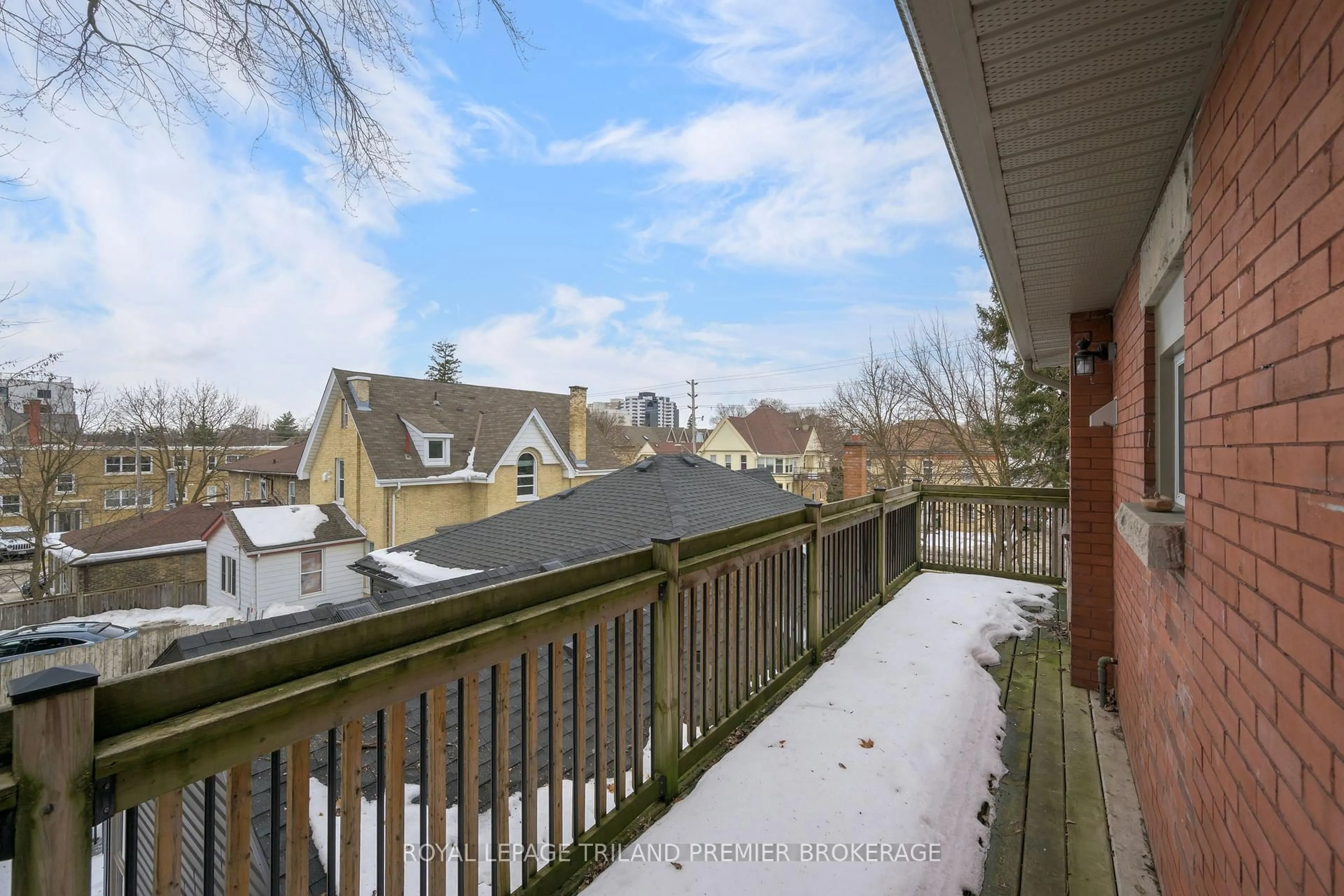 Patio, city buildings view from balcony for 100 Central Ave, London East Ontario N6A 1M4