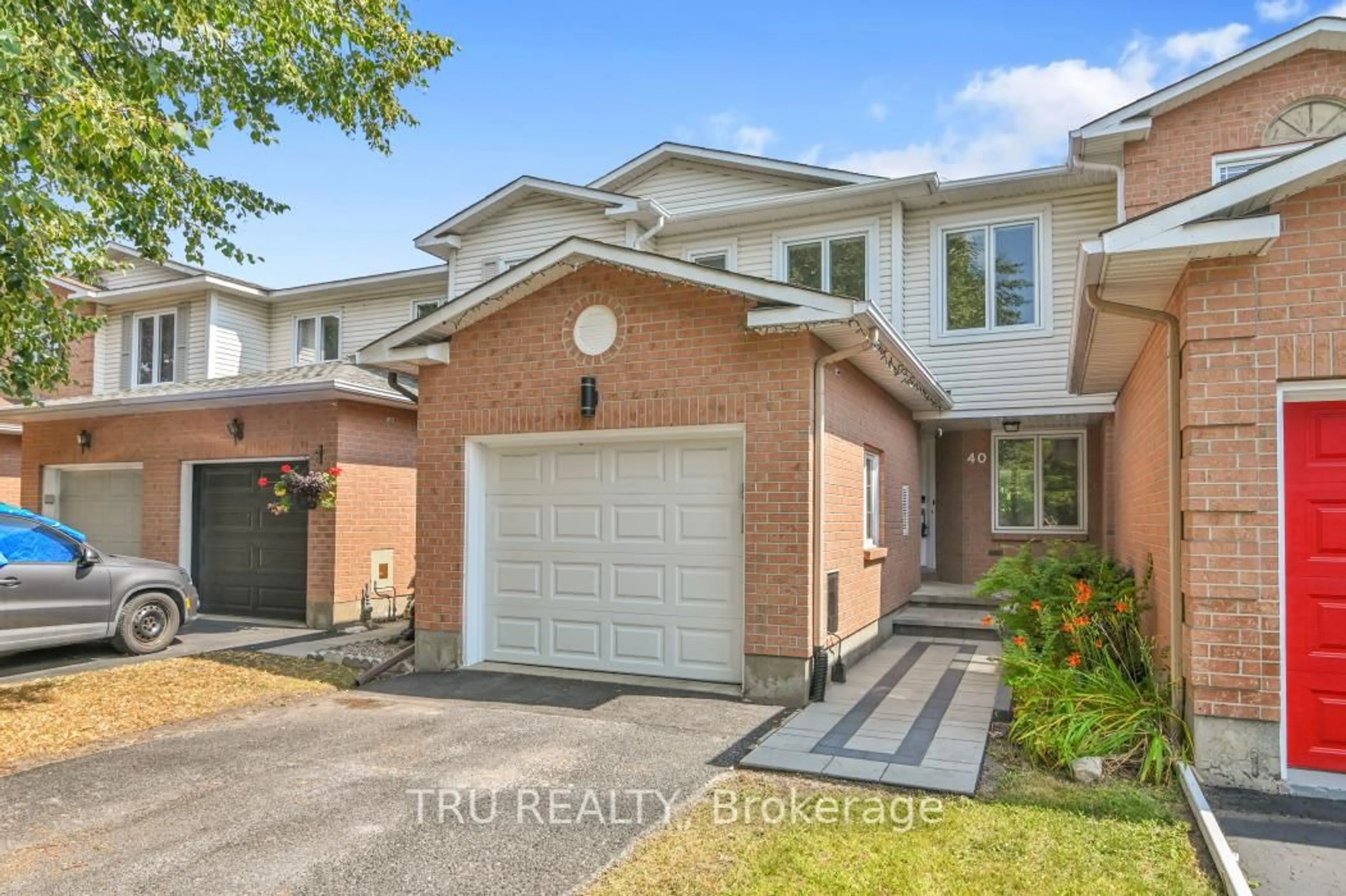 Home with brick exterior material, street for 40 Baton Crt, Kanata Ontario K2L 4C8