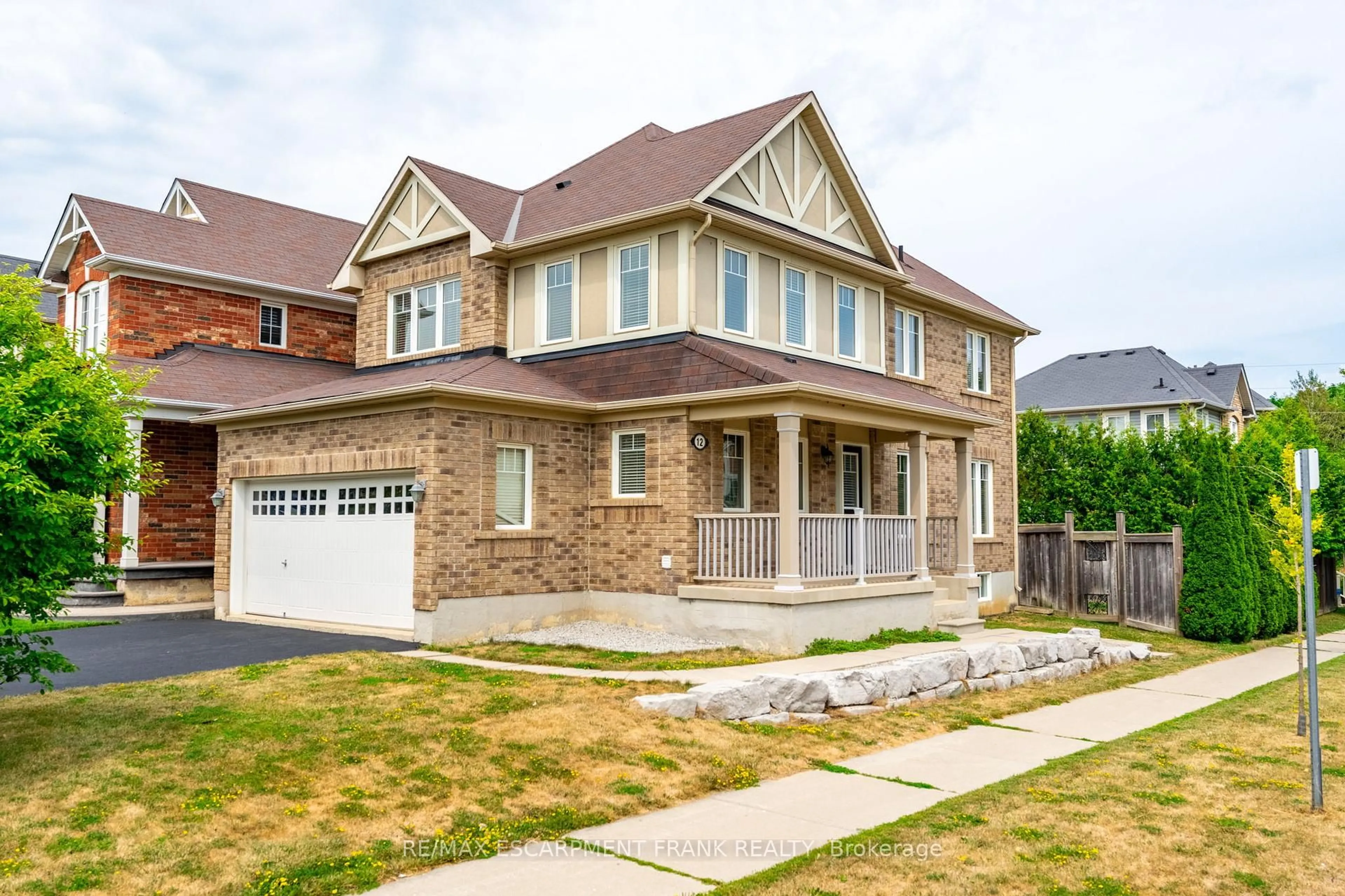Home with brick exterior material, street for 12 EMICK Dr, Hamilton Ontario L9K 0C8