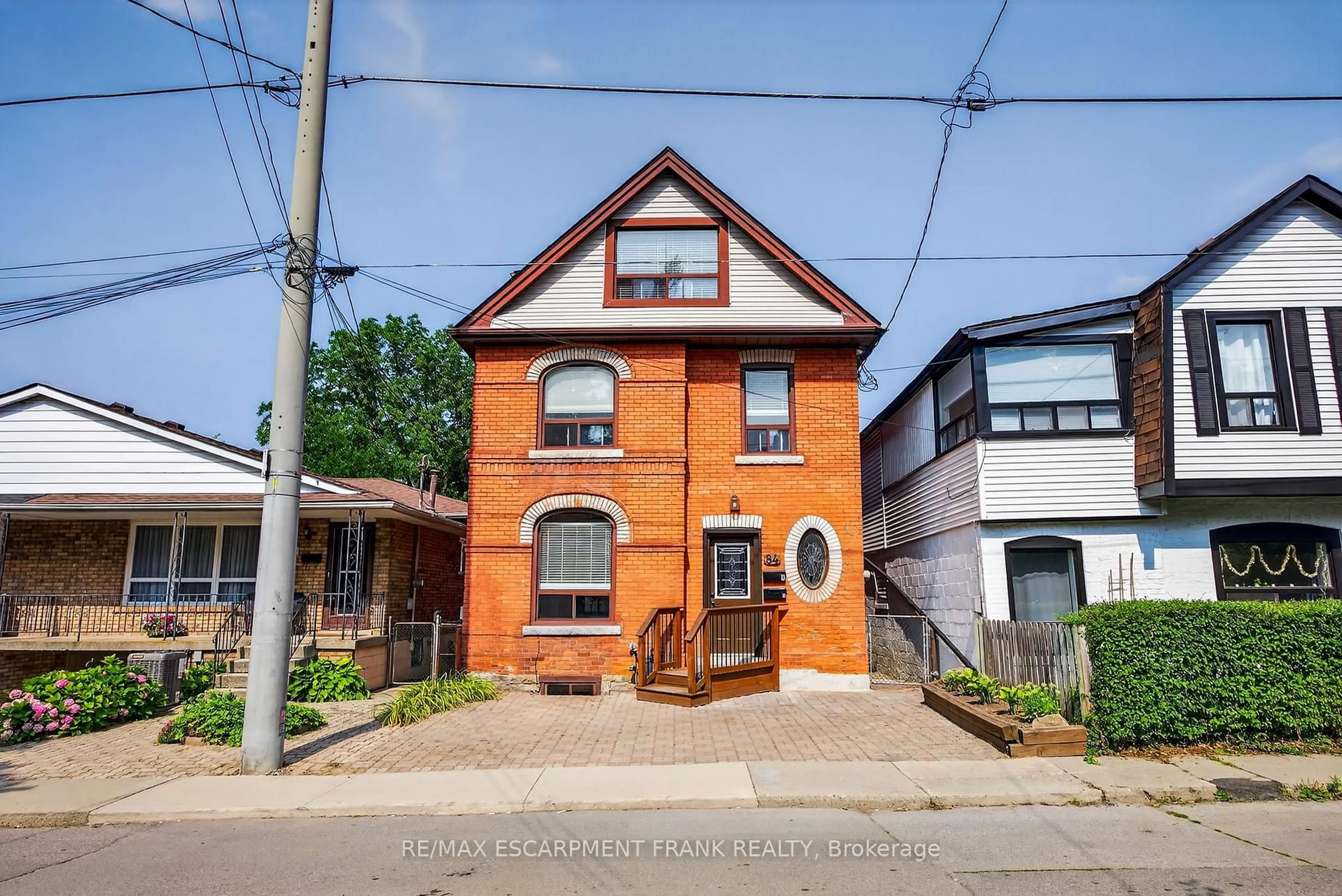 Home with brick exterior material, street for 84 RAY St, Hamilton Ontario L8P 3V7