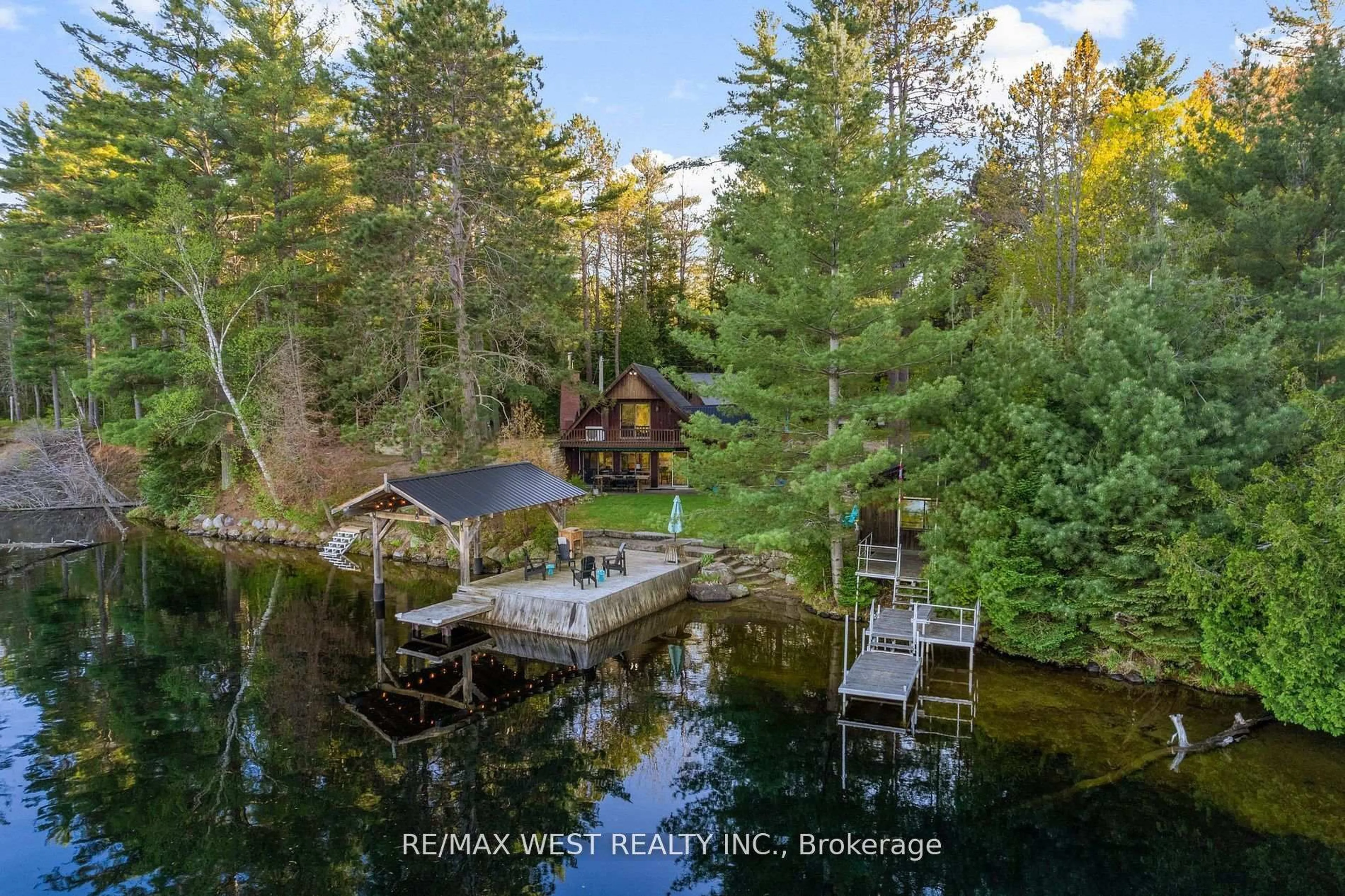 A pic from outside/outdoor area/front of a property/back of a property/a pic from drone, water/lake/river/ocean view for 440 Ohio Rd, Combermere Ontario K0J 1L0