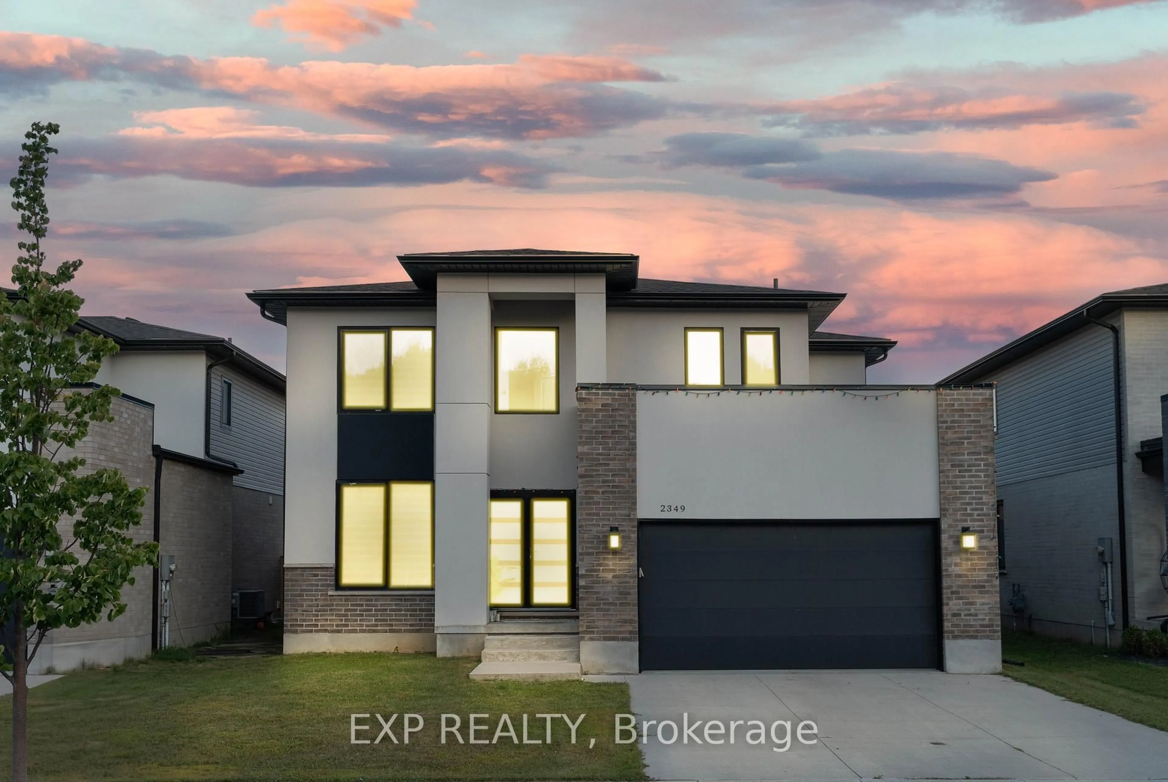 A pic from outside/outdoor area/front of a property/back of a property/a pic from drone, street for 2349 Red Thorne Ave, London South Ontario N6P 0E8