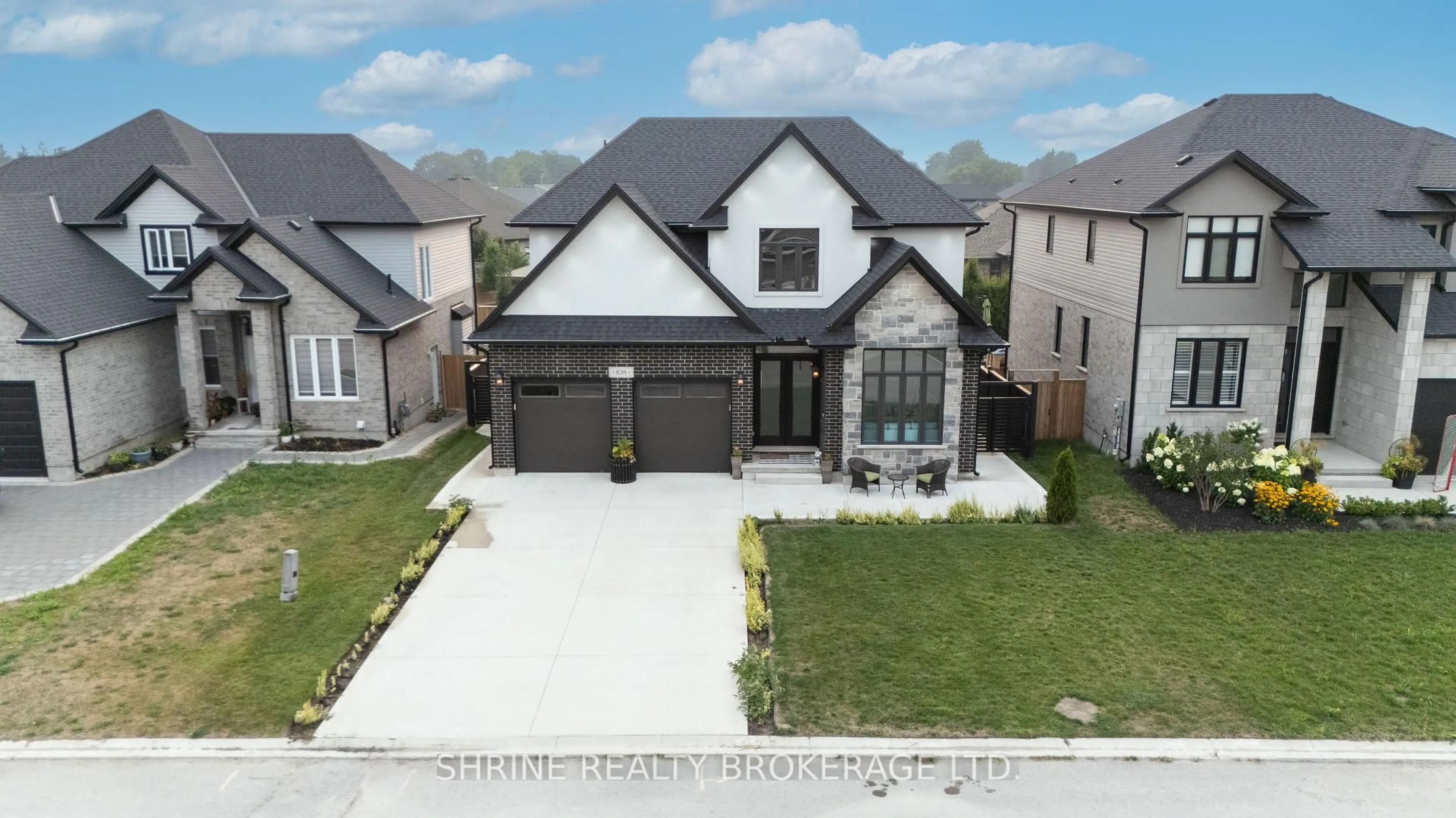 Home with brick exterior material, street for 108 Watts Dr, Lucan Biddulph Ontario N0M 2J0