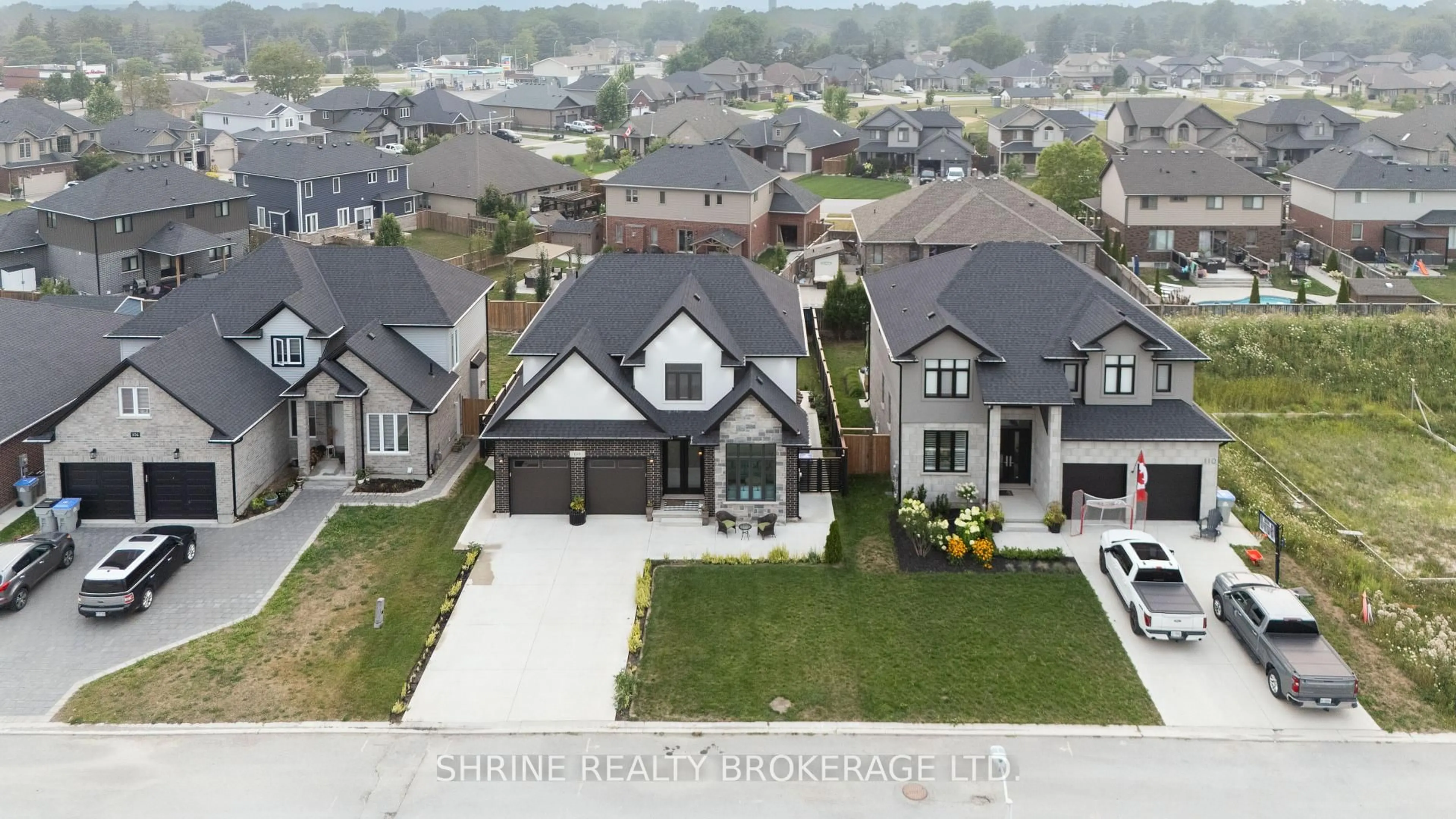 A pic from outside/outdoor area/front of a property/back of a property/a pic from drone, street for 108 Watts Dr, Lucan Biddulph Ontario N0M 2J0