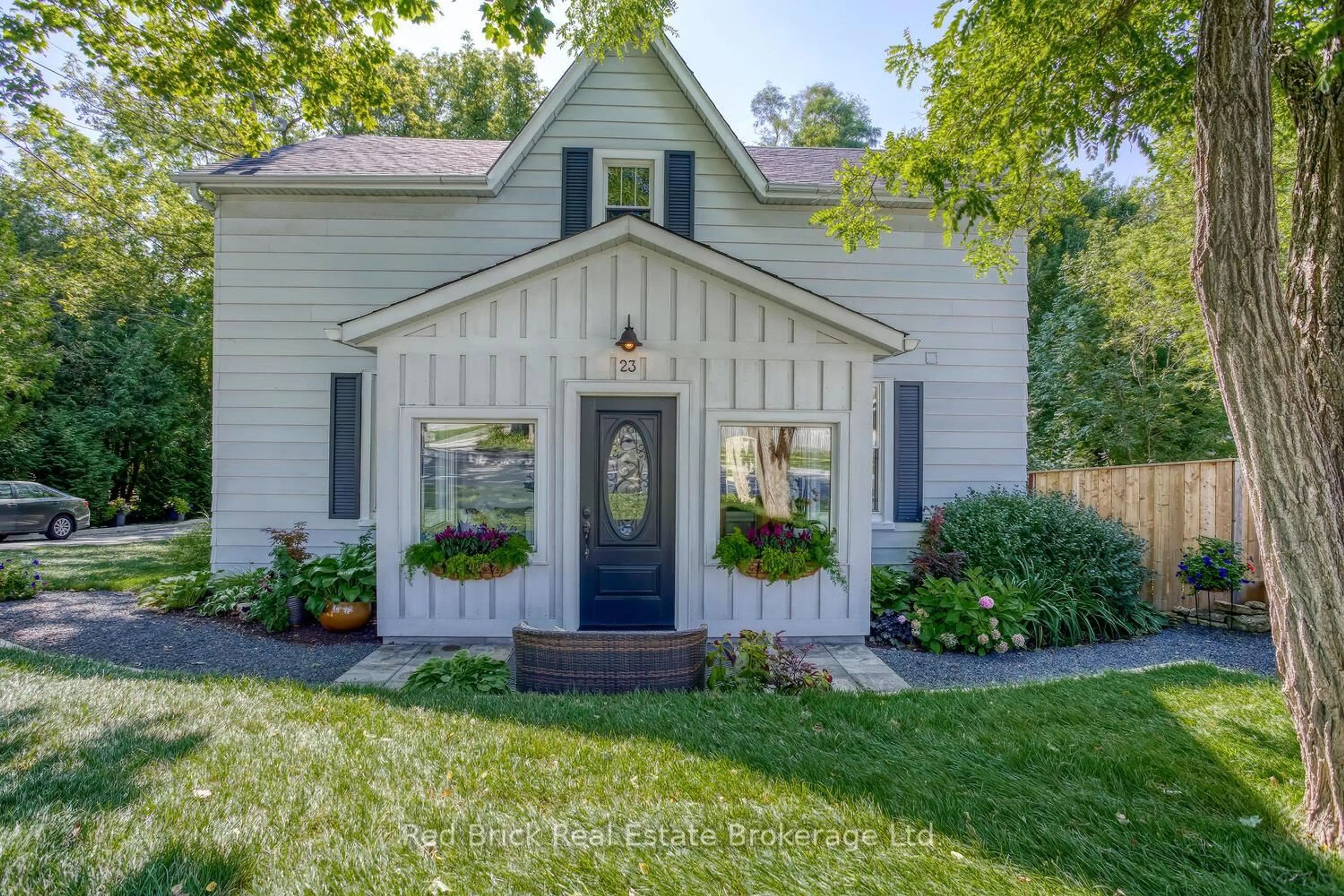 Home with vinyl exterior material, street for 23 Mill St, Centre Wellington Ontario N0B 1S0
