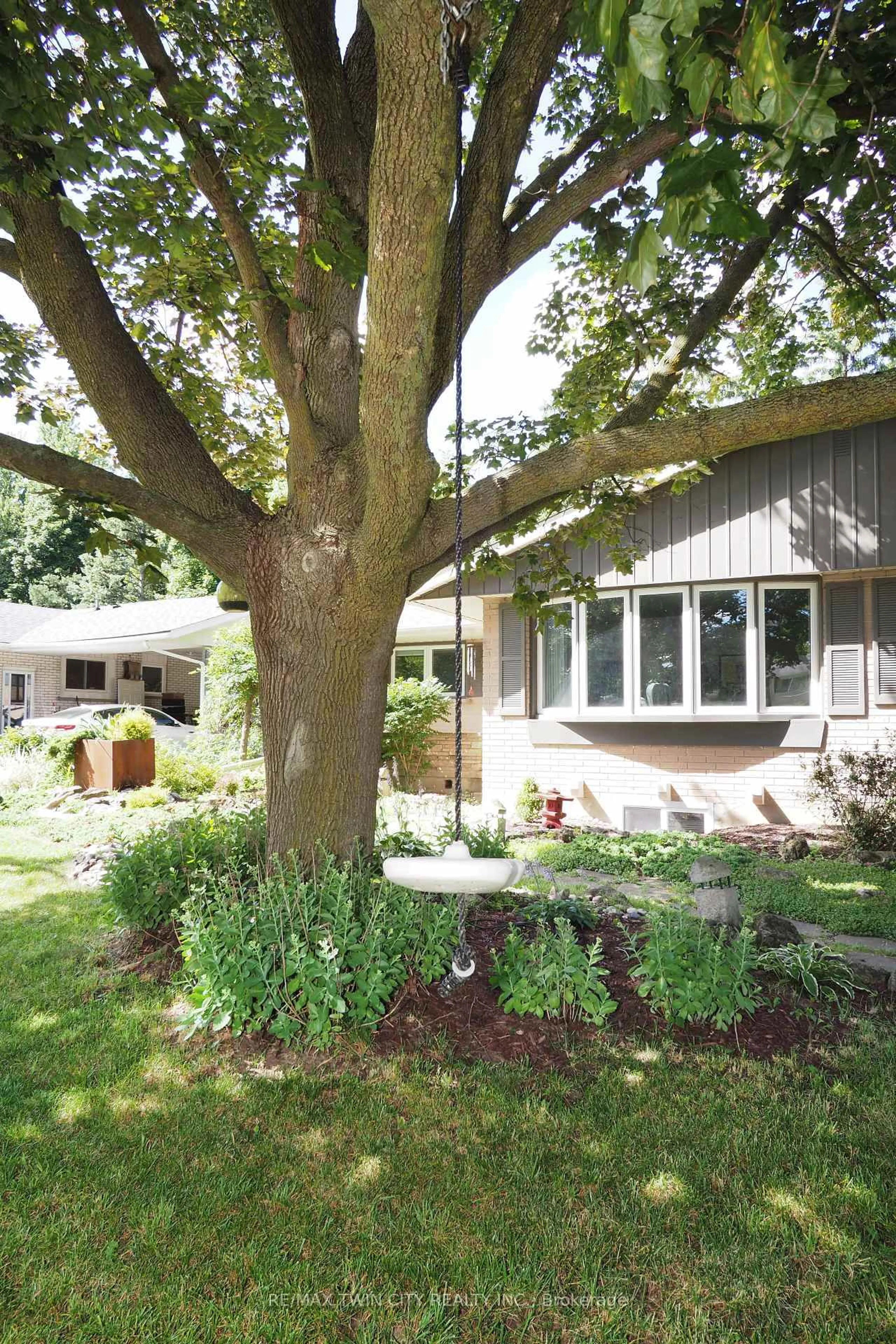 Home with vinyl exterior material, street for 218 Greenbrook Dr, Kitchener Ontario N2M 4J7