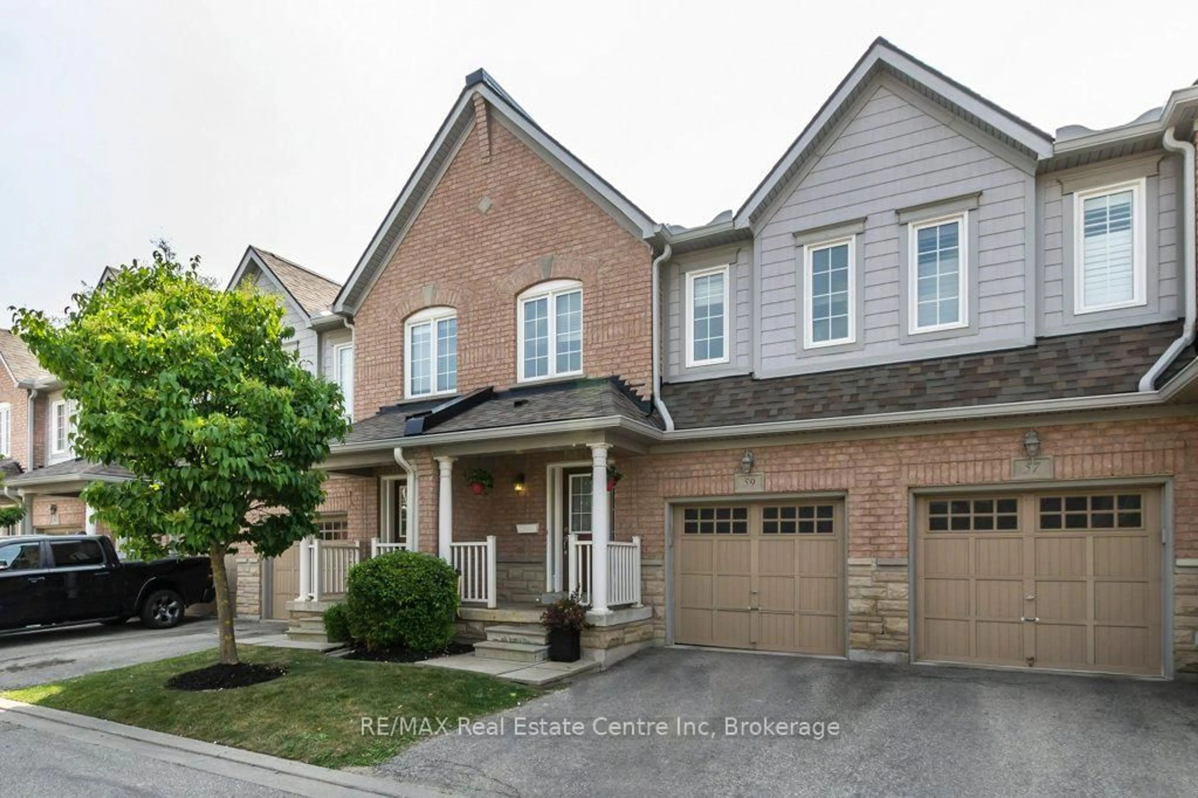 Home with brick exterior material, street for 1035 Victoria Rd #59, Guelph Ontario N1L 1B3