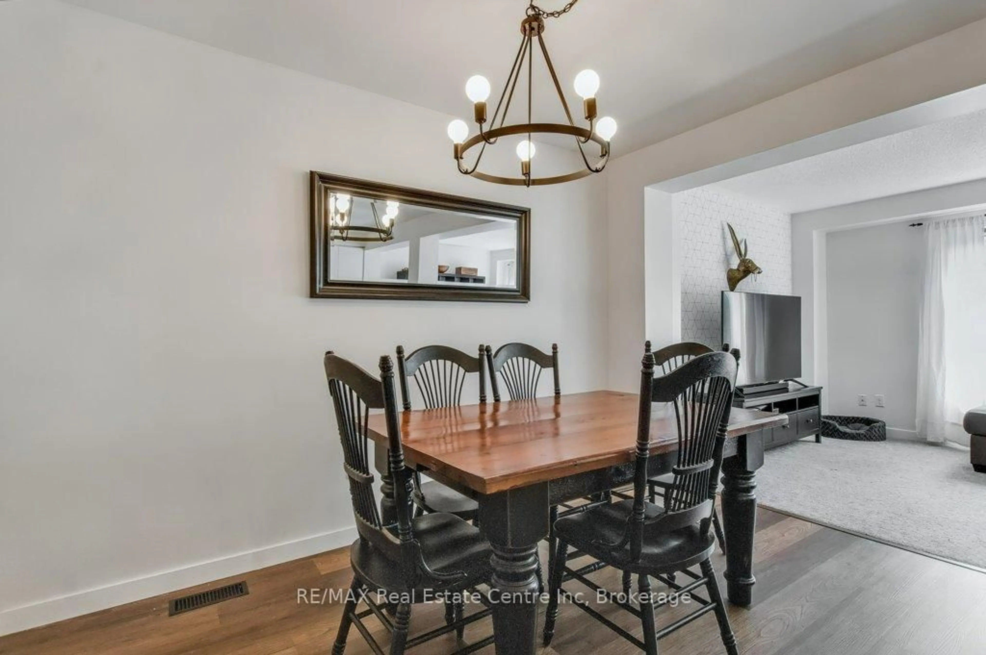 Dining room, wood/laminate floor for 1035 Victoria Rd #59, Guelph Ontario N1L 1B3