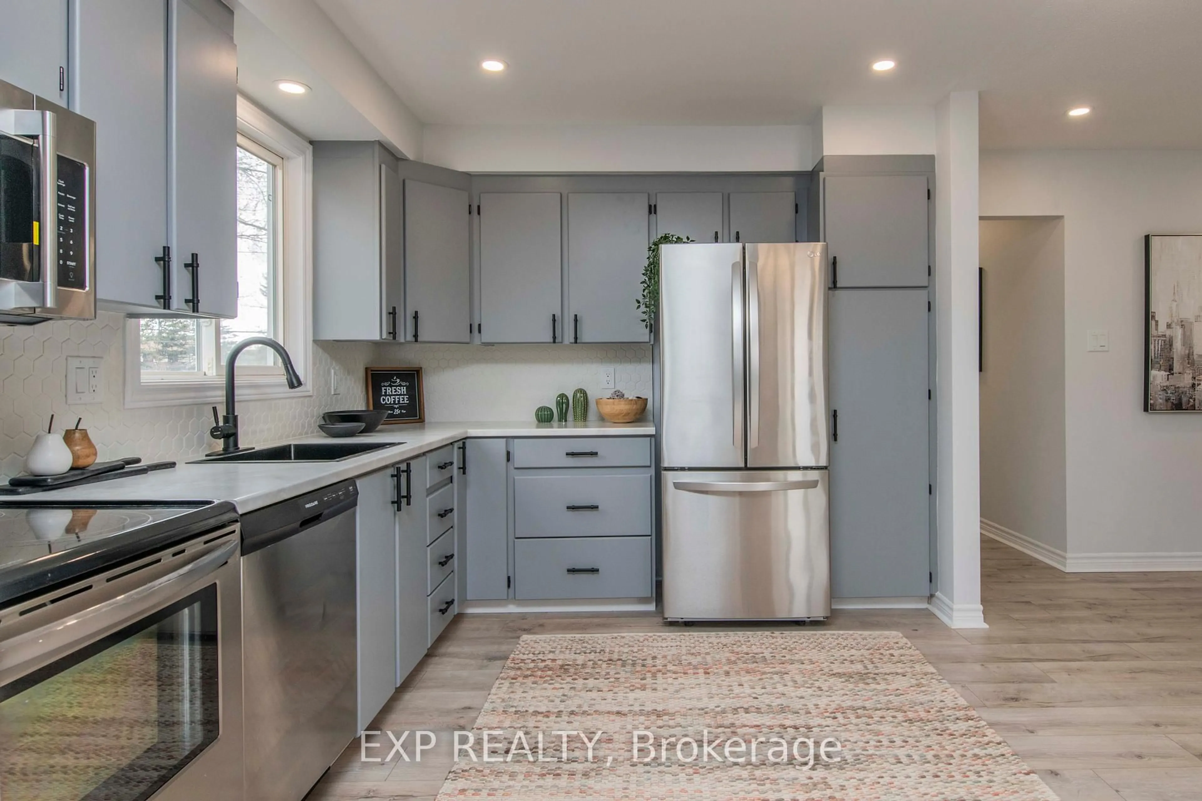 Open concept kitchen, ceramic/tile floor for 15 Kadeer Way, Ottawa Ontario K2J 1J6