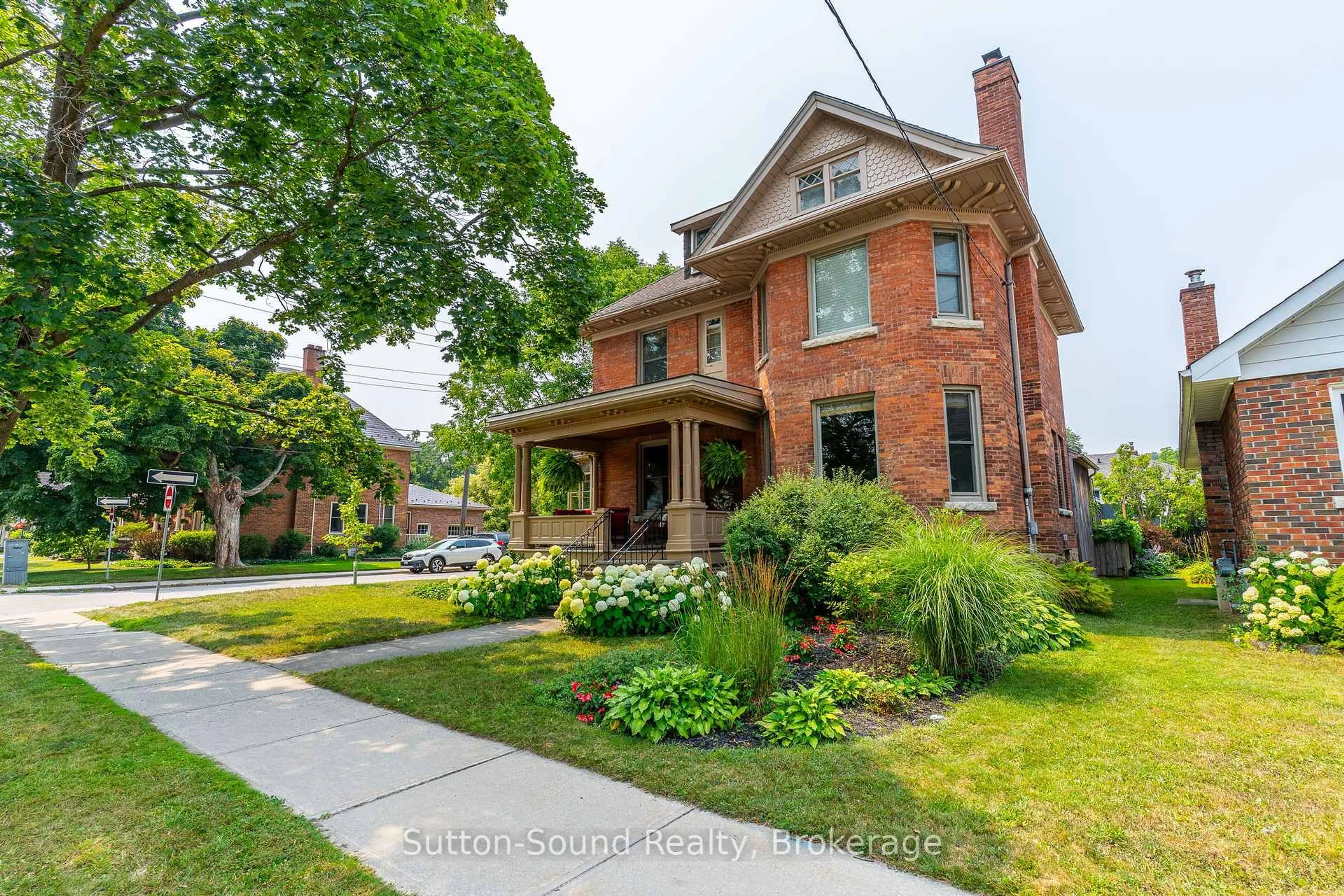 Home with brick exterior material, street for 1304 4th Ave, Owen Sound Ontario N4K 4W8