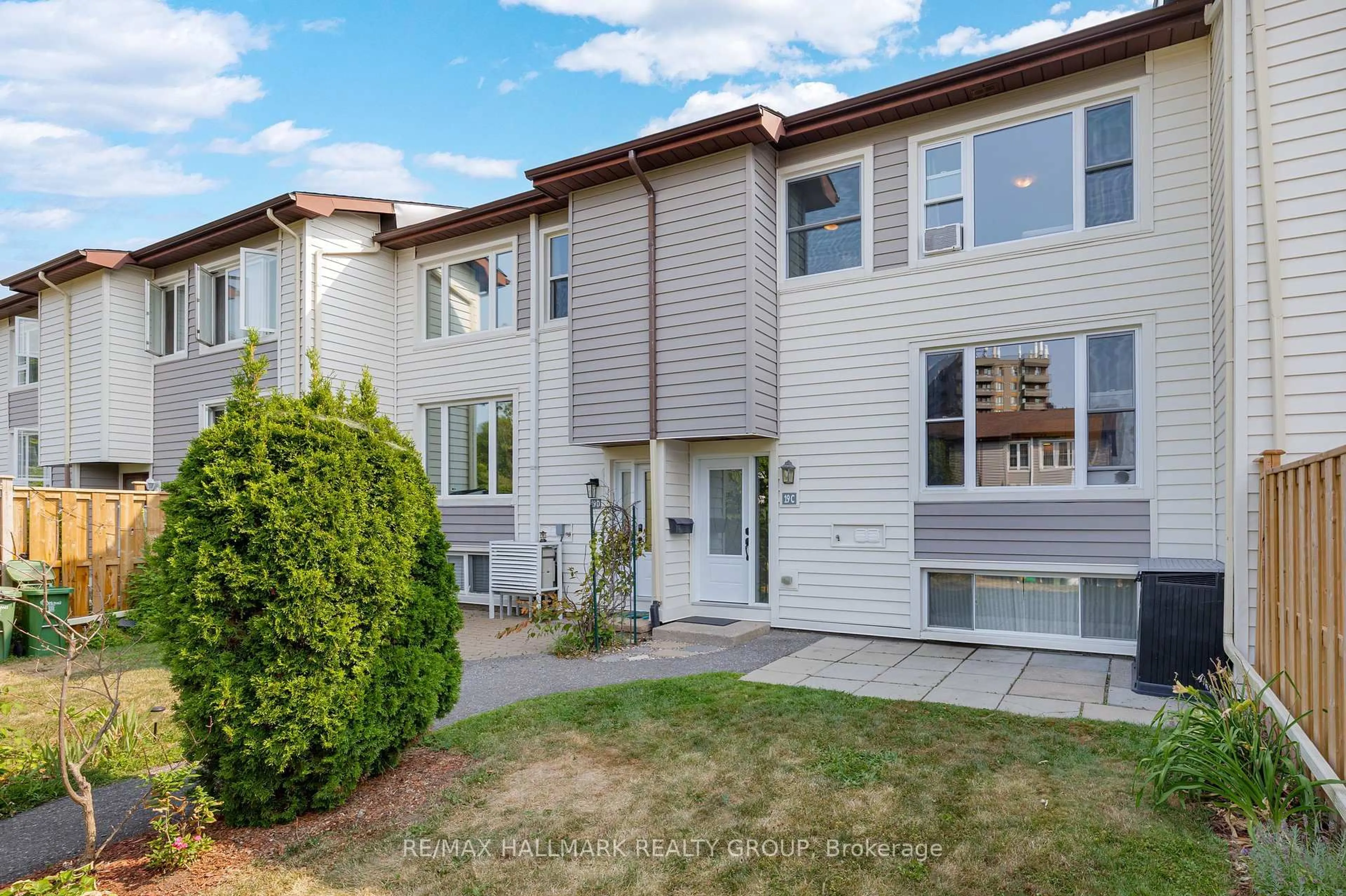 Home with vinyl exterior material, street for 19 BANNER Rd #C, Ottawa Ontario K2H 8T3
