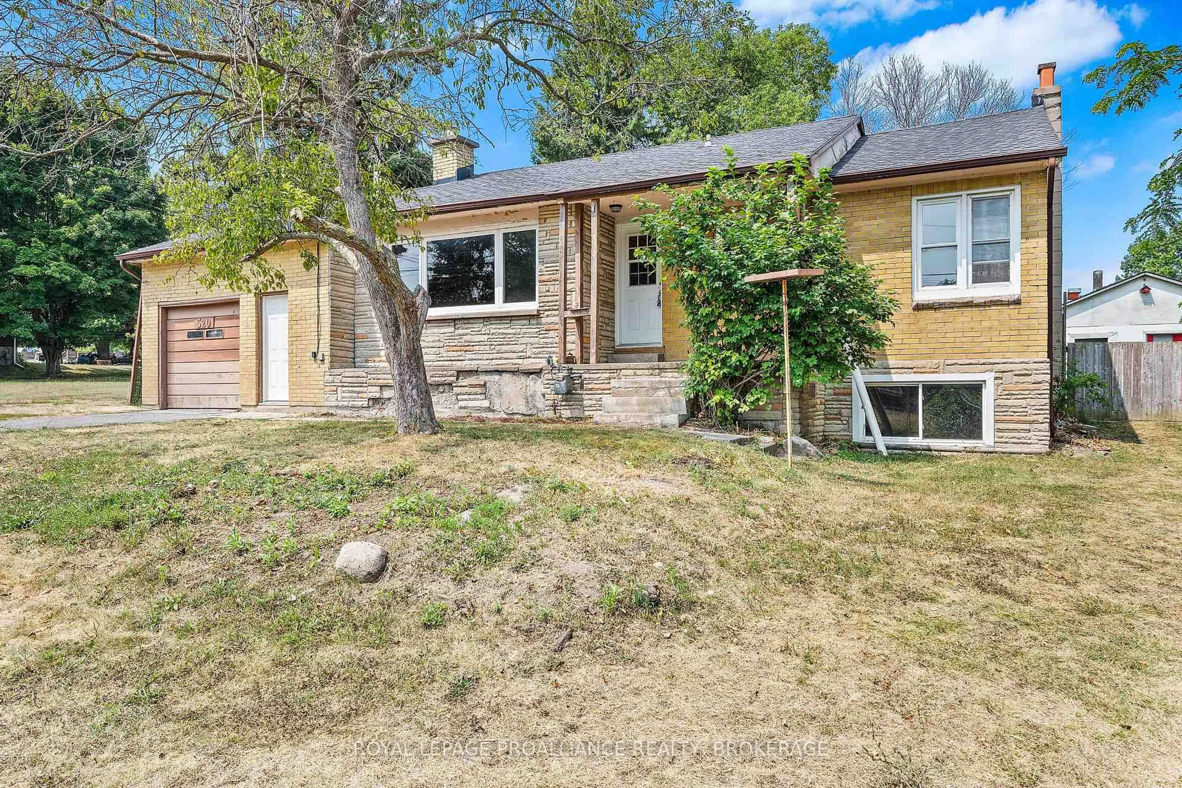 Home with brick exterior material, street for 320 Academy St, Bath Ontario K0H 1G0