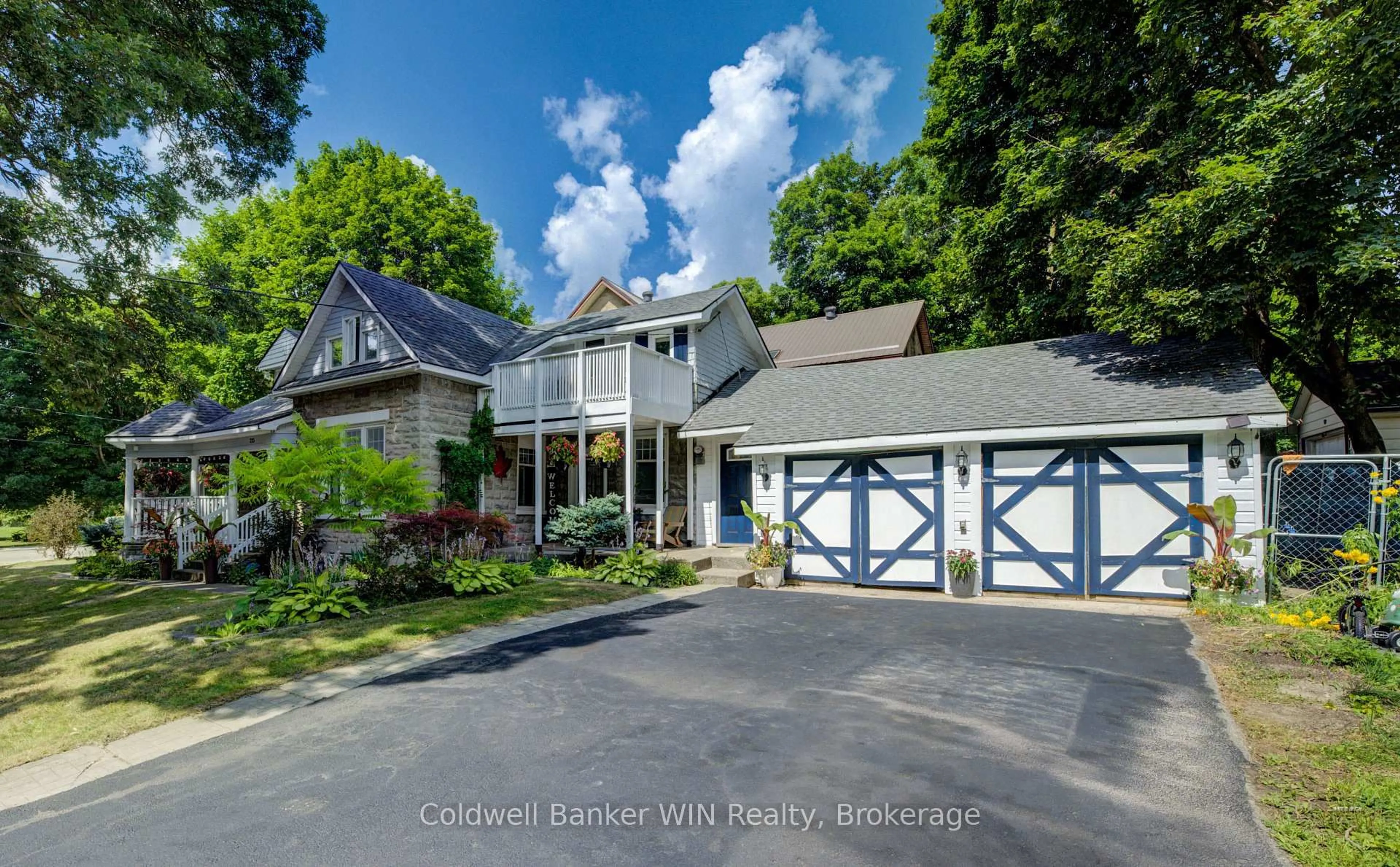 A pic from outside/outdoor area/front of a property/back of a property/a pic from drone, water/lake/river/ocean view for 215 Birmingham St, Wellington North Ontario N0G 2L2