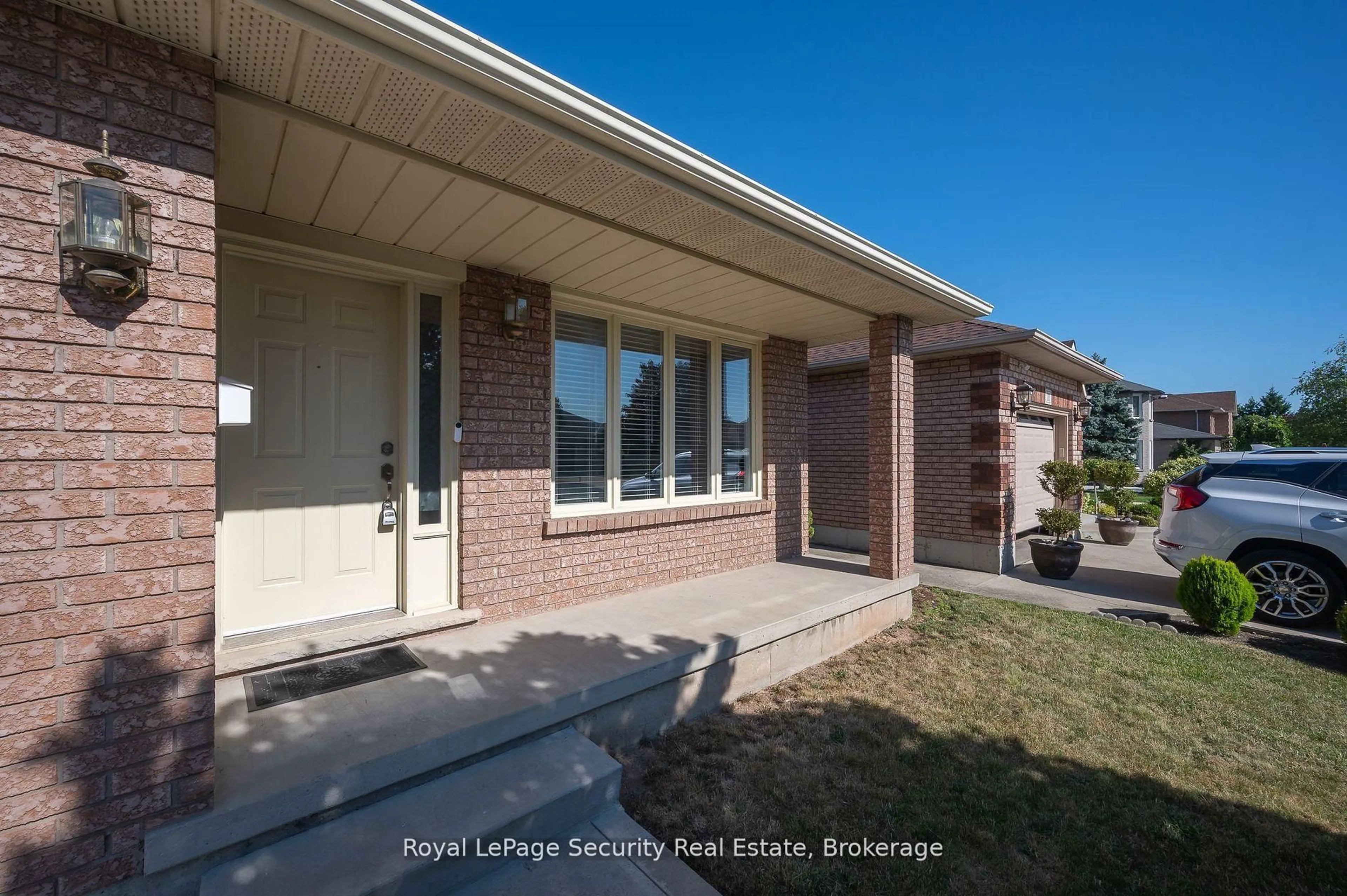 Home with brick exterior material, street for 107 Fairington Cres, Hamilton Ontario L8E 3N3