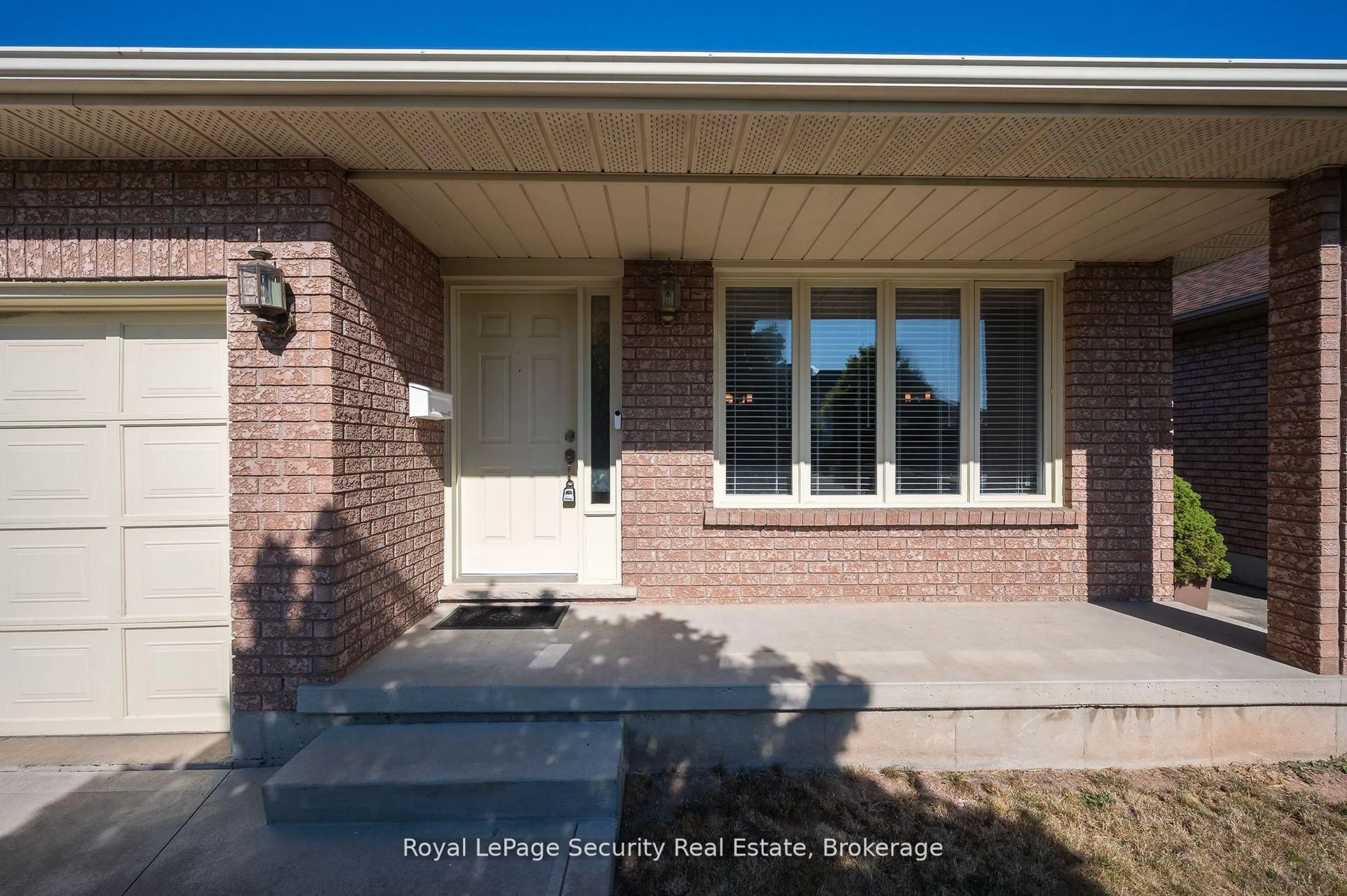 Home with brick exterior material, street for 107 Fairington Cres, Hamilton Ontario L8E 3N3
