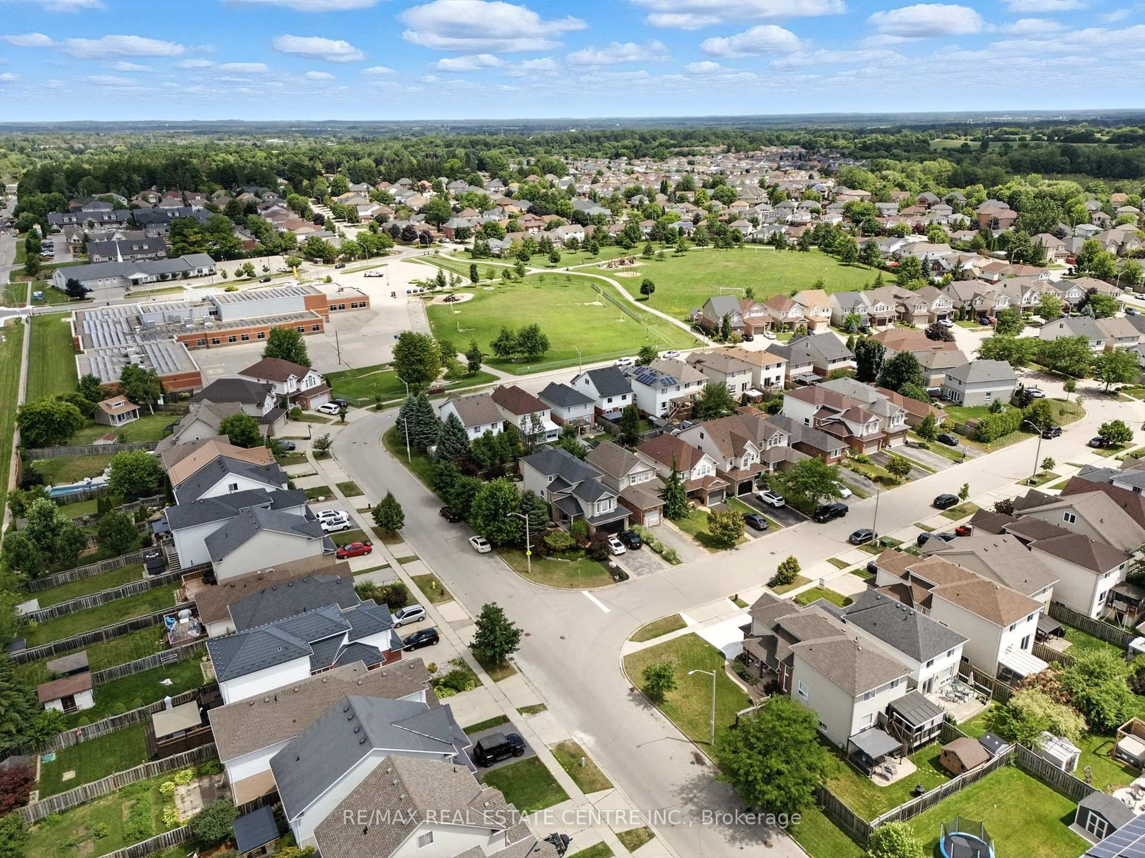A pic from outside/outdoor area/front of a property/back of a property/a pic from drone, street for 63 Waffler Cres, Cambridge Ontario N1P 1H7