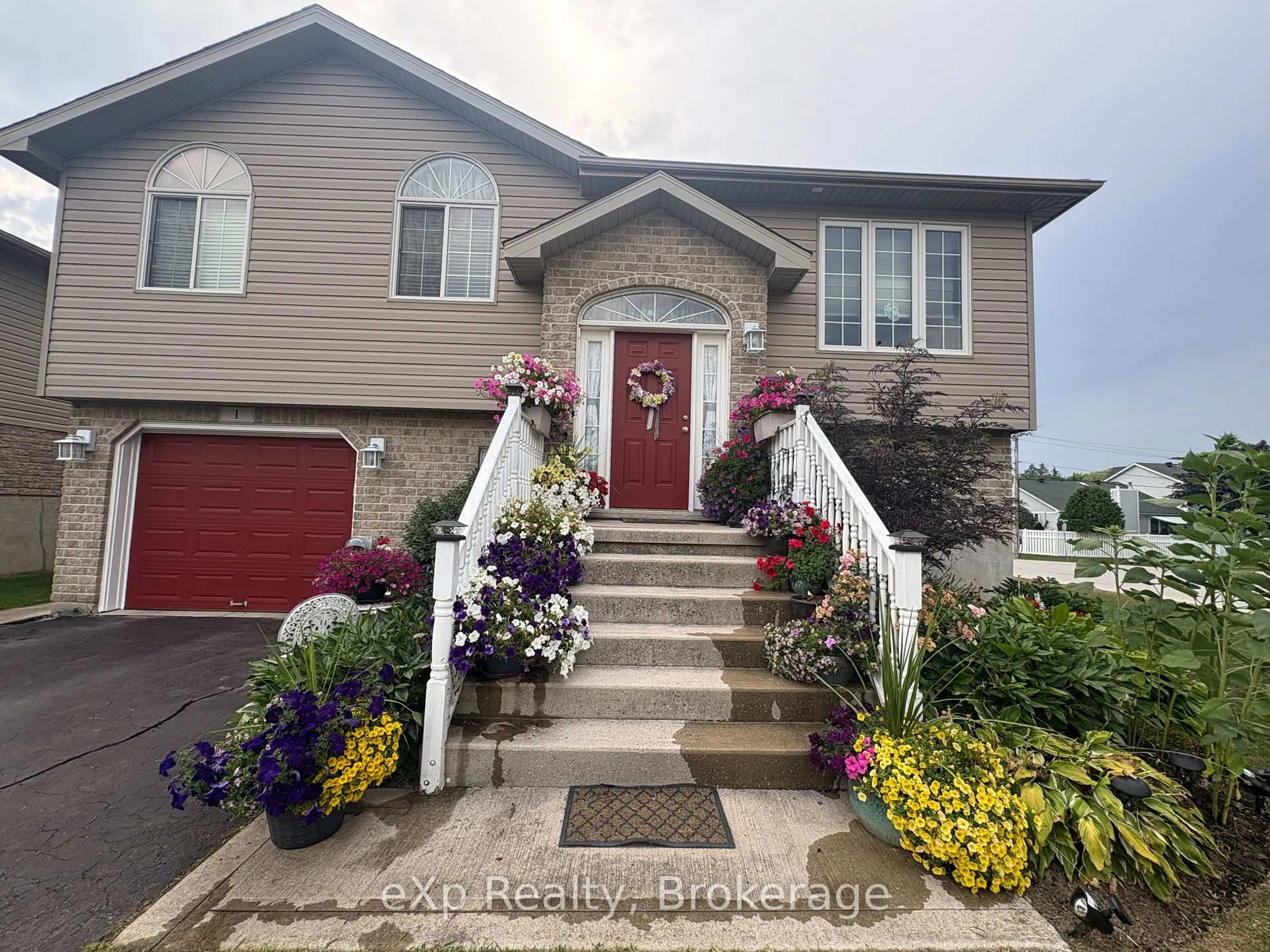 Home with vinyl exterior material, street for 1 St.  Andrews Dr, Meaford Ontario N4L 0A2
