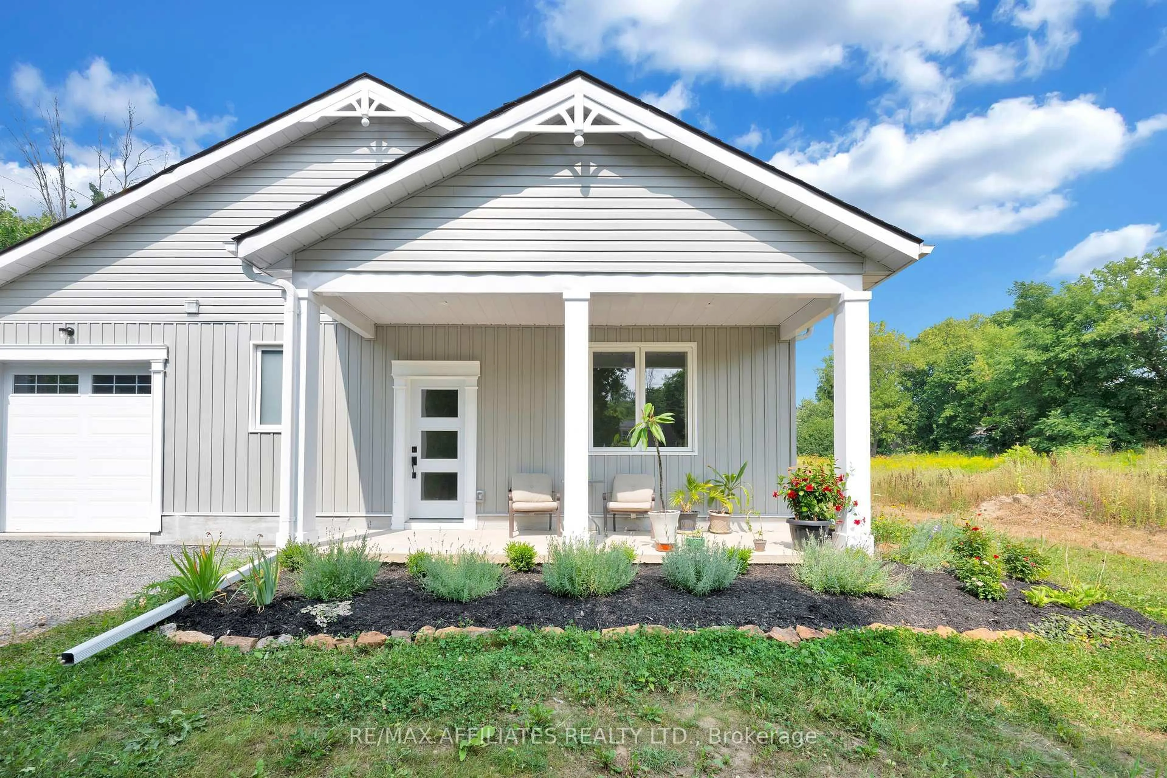 Home with vinyl exterior material, street for 8 Simcoe St, Rideau Lakes Ontario K0G 1P0