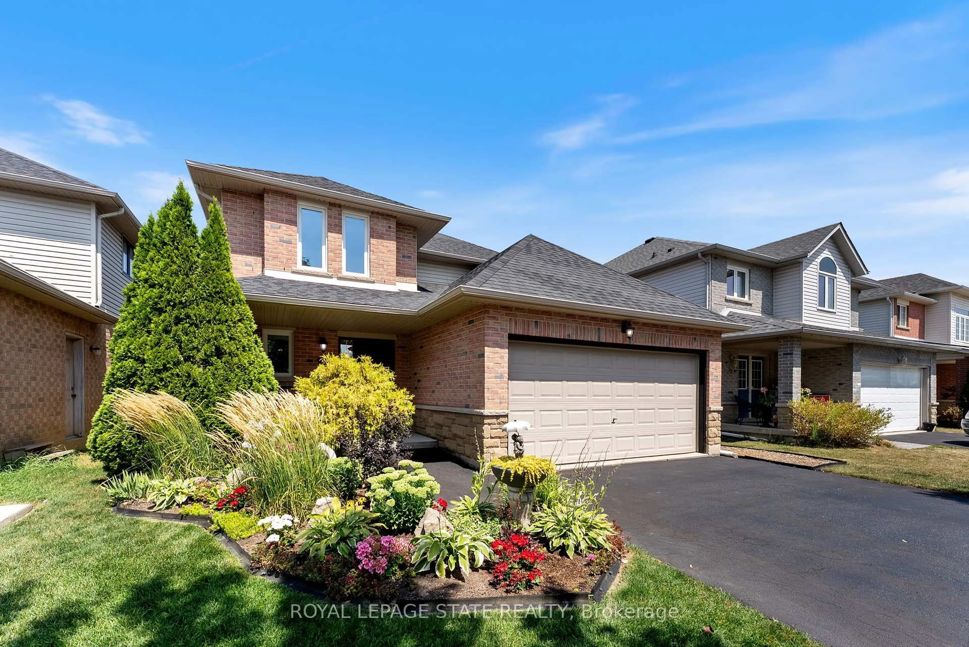 Home with brick exterior material, street for 18 Rosebury Way, Hamilton Ontario L0R 1W0