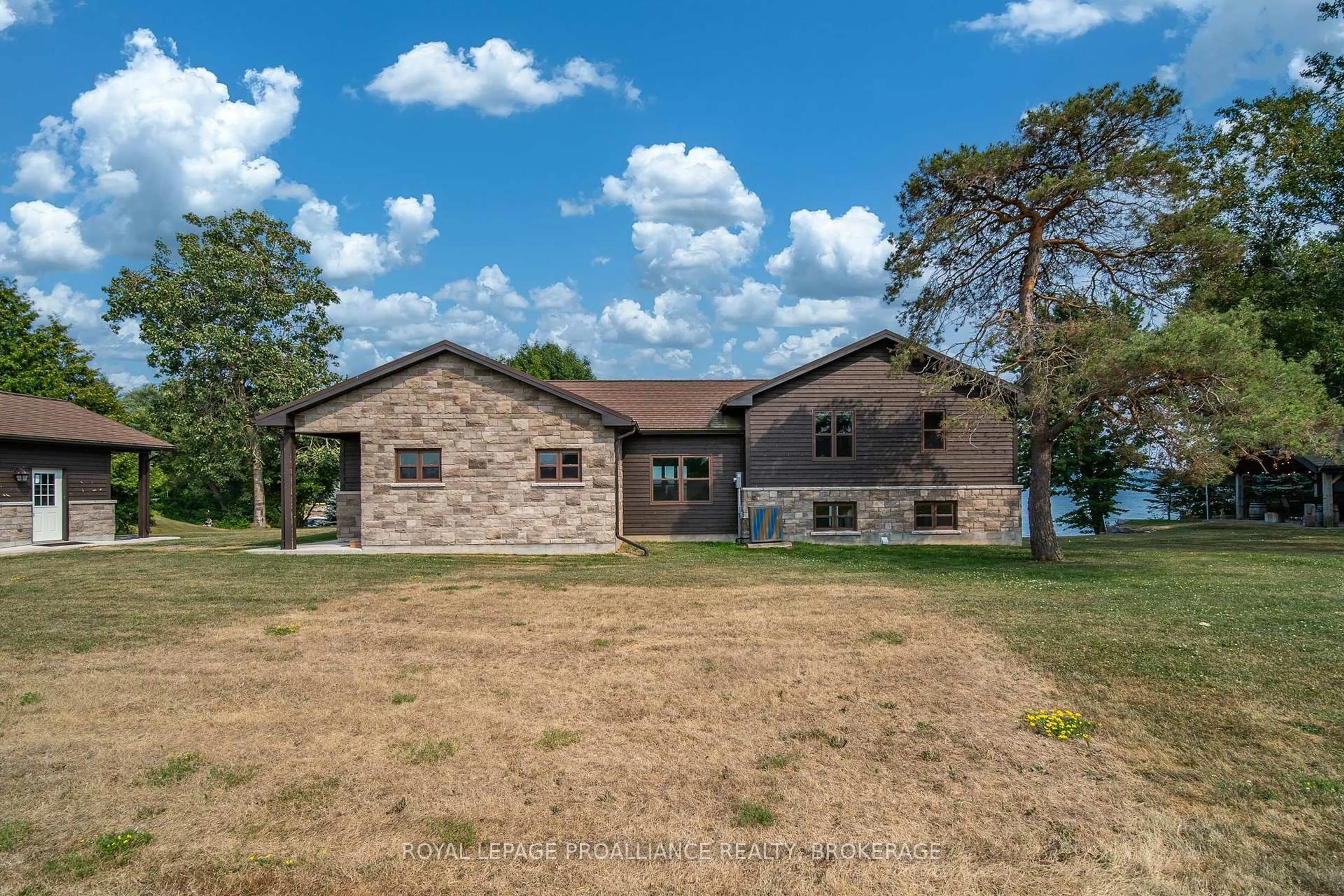 A pic from outside/outdoor area/front of a property/back of a property/a pic from drone, unknown for 199 & 213 Leone's Cove Lane, Wolfe Island Ontario K0H 2Y0