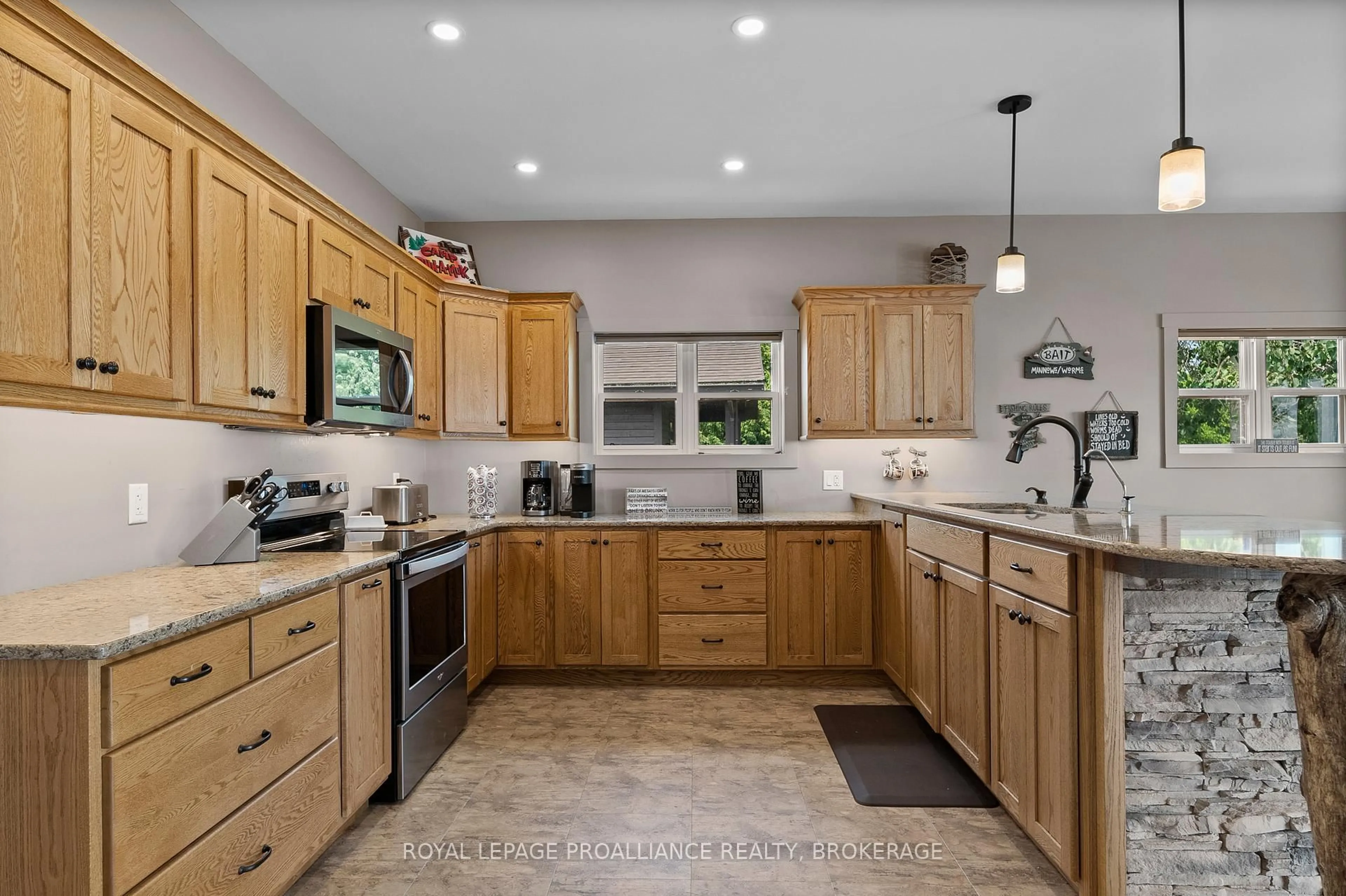 Open concept kitchen, ceramic/tile floor for 199 & 213 Leone's Cove Lane, Wolfe Island Ontario K0H 2Y0