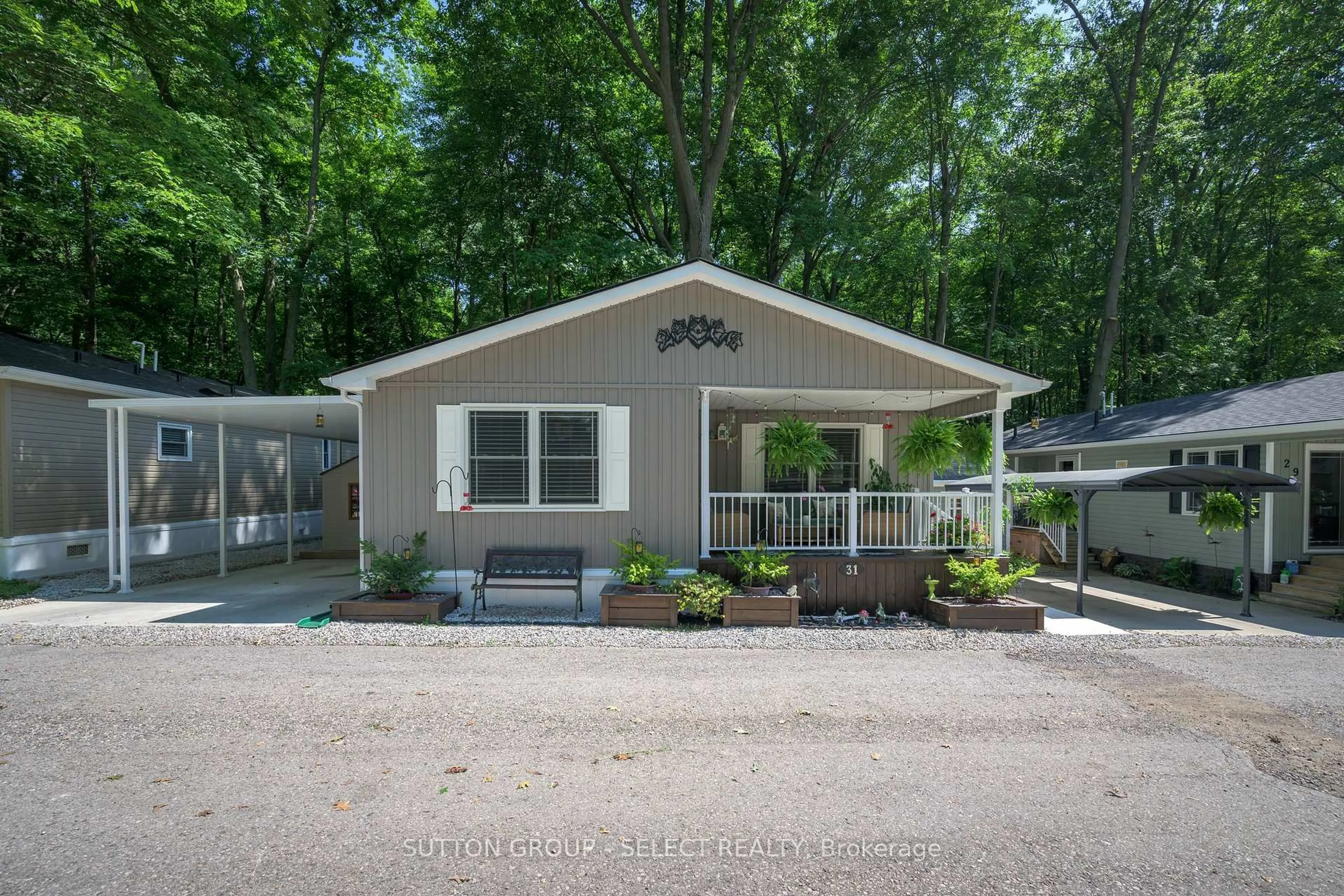 Home with vinyl exterior material, street for 22790 AMIENS Rd #31, Middlesex Centre Ontario N0L 1R0