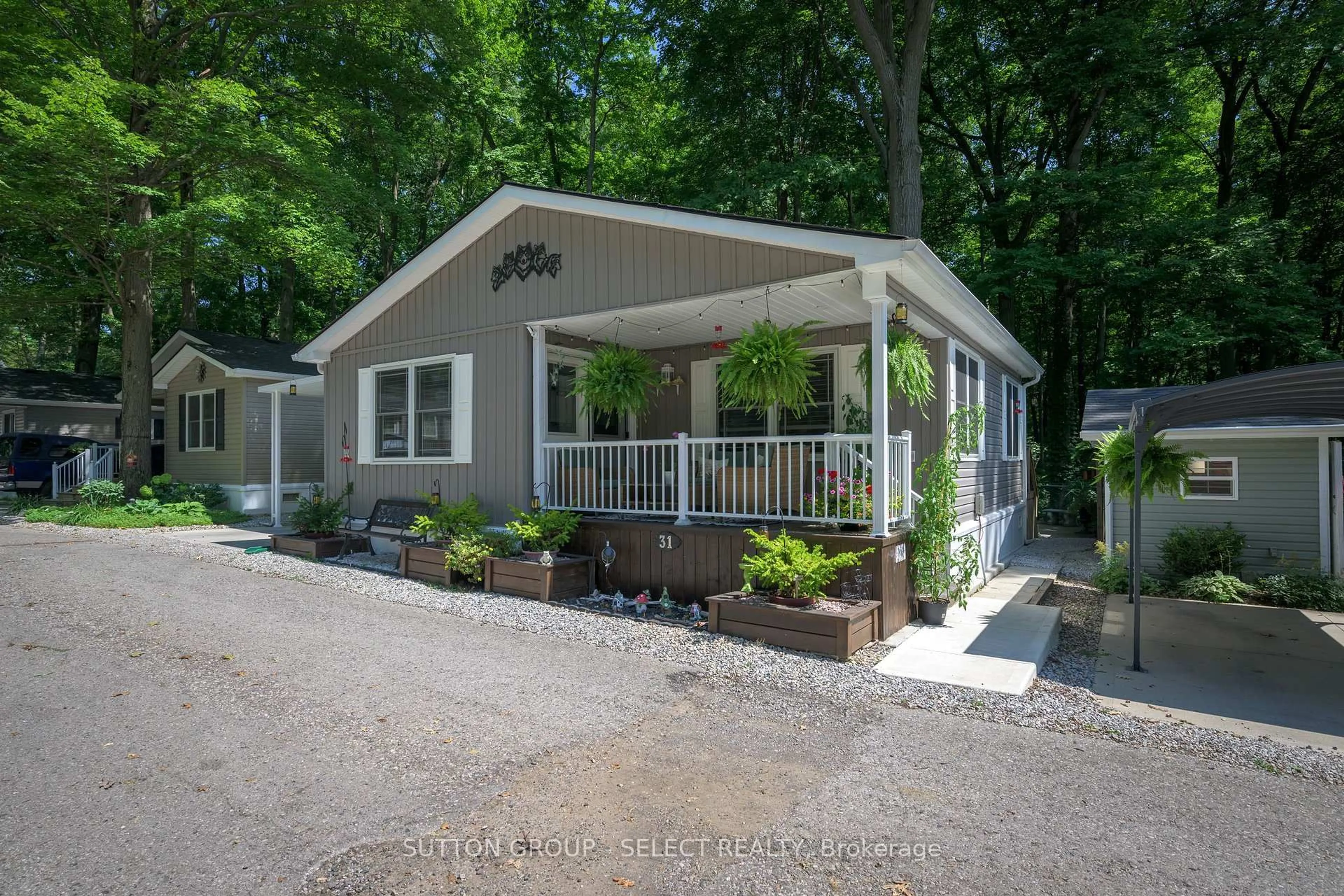 Home with vinyl exterior material, street for 22790 AMIENS Rd #31, Middlesex Centre Ontario N0L 1R0