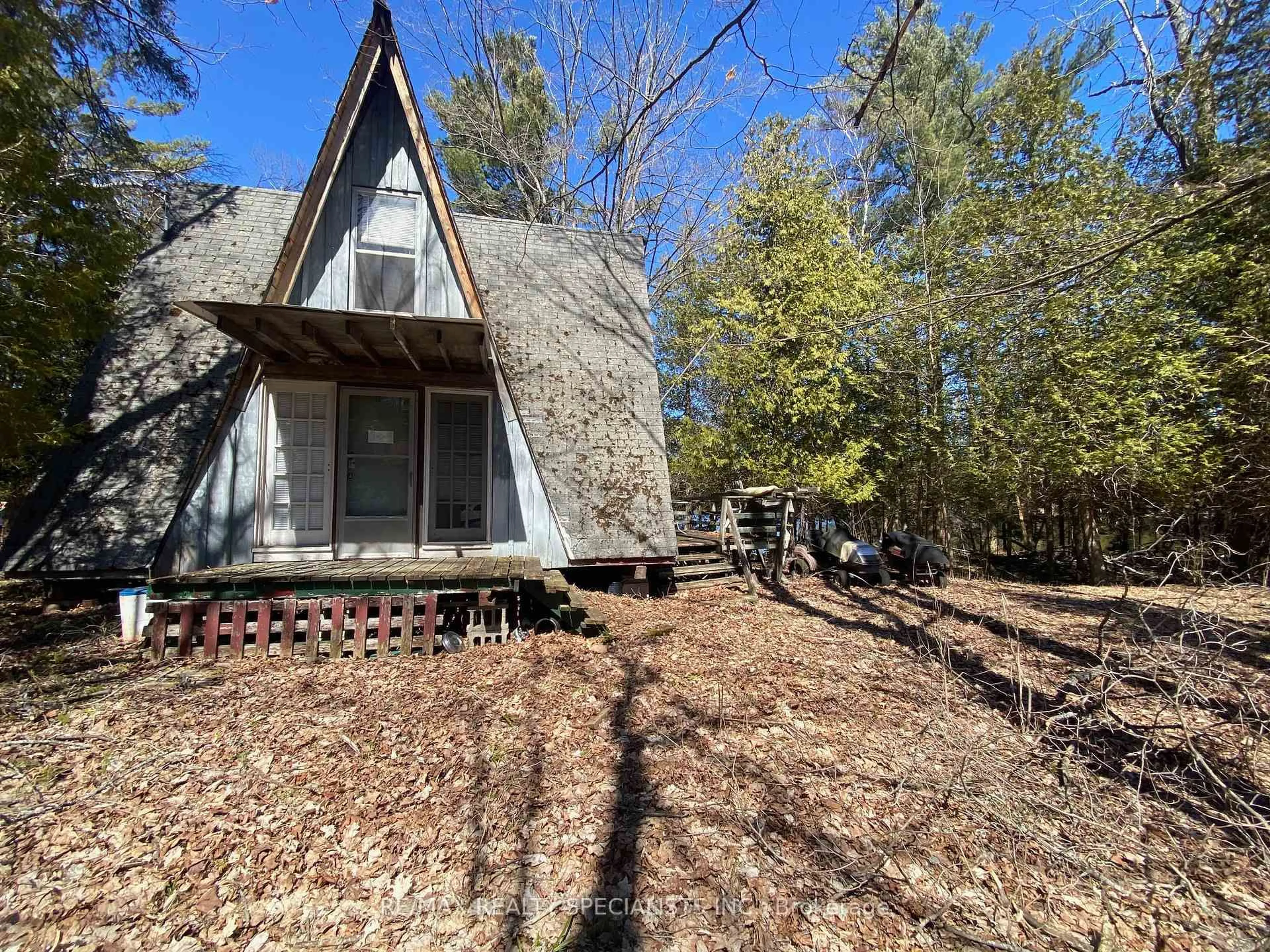 A pic from outside/outdoor area/front of a property/back of a property/a pic from drone, forest/trees view for 115 PEARCE Rd, Kawartha Lakes Ontario K0M 1K0