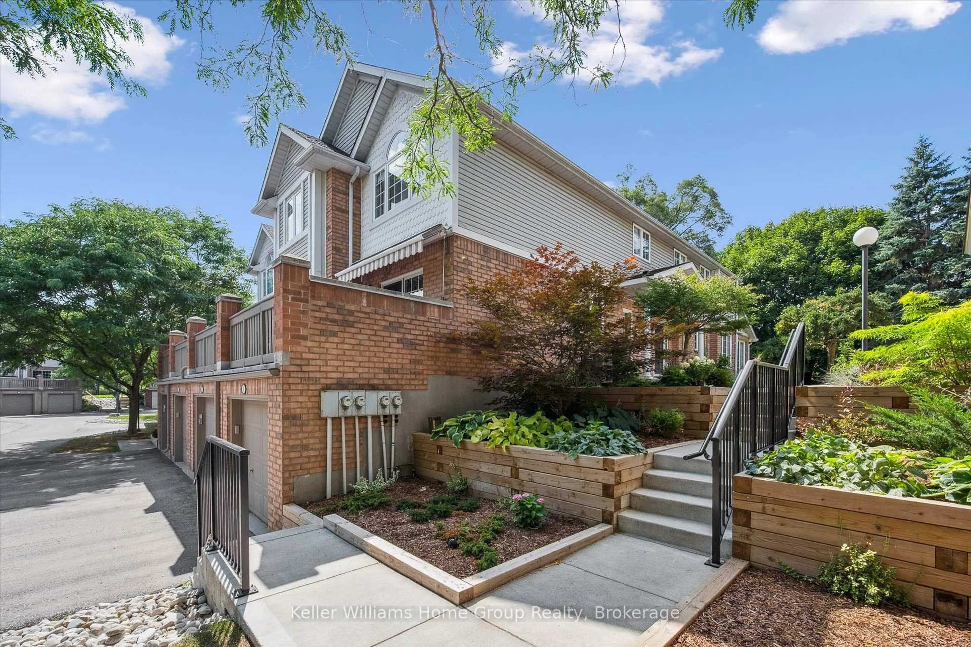Home with brick exterior material, street for 941 Gordon St #14, Guelph Ontario N1G 4R9